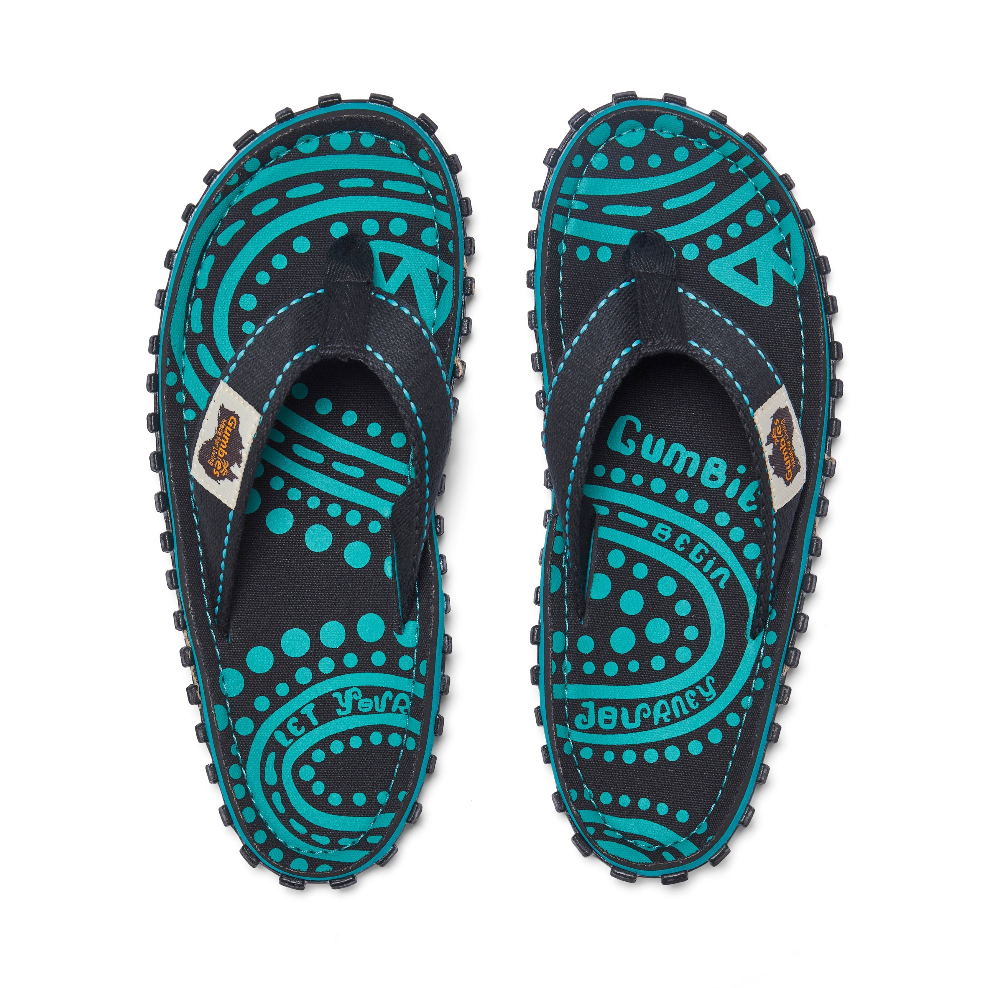 Pair of black and teal patterned sandals with 'Gumbies' branding on a white background