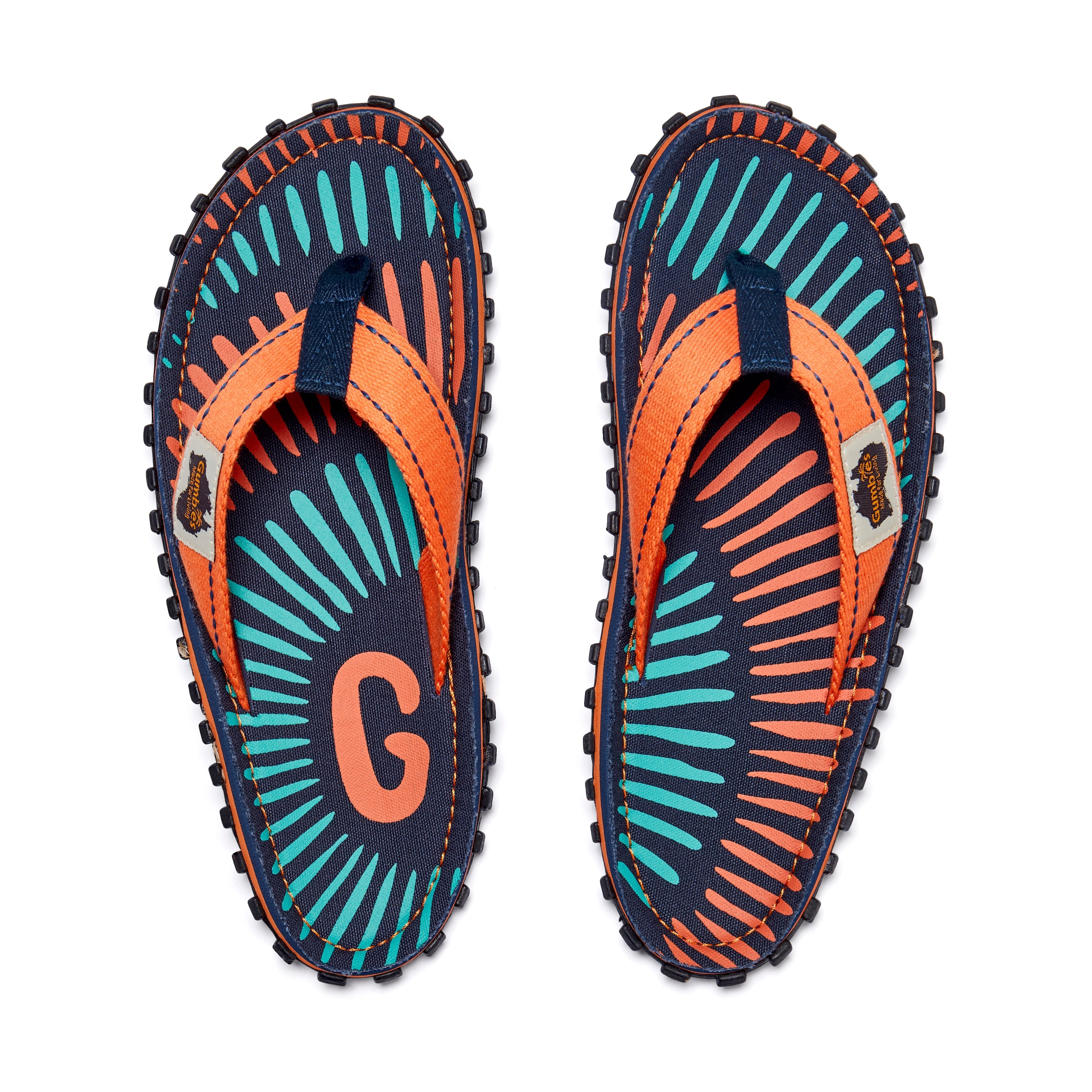 Pair of colorful flip-flops with a pattern on a white background
