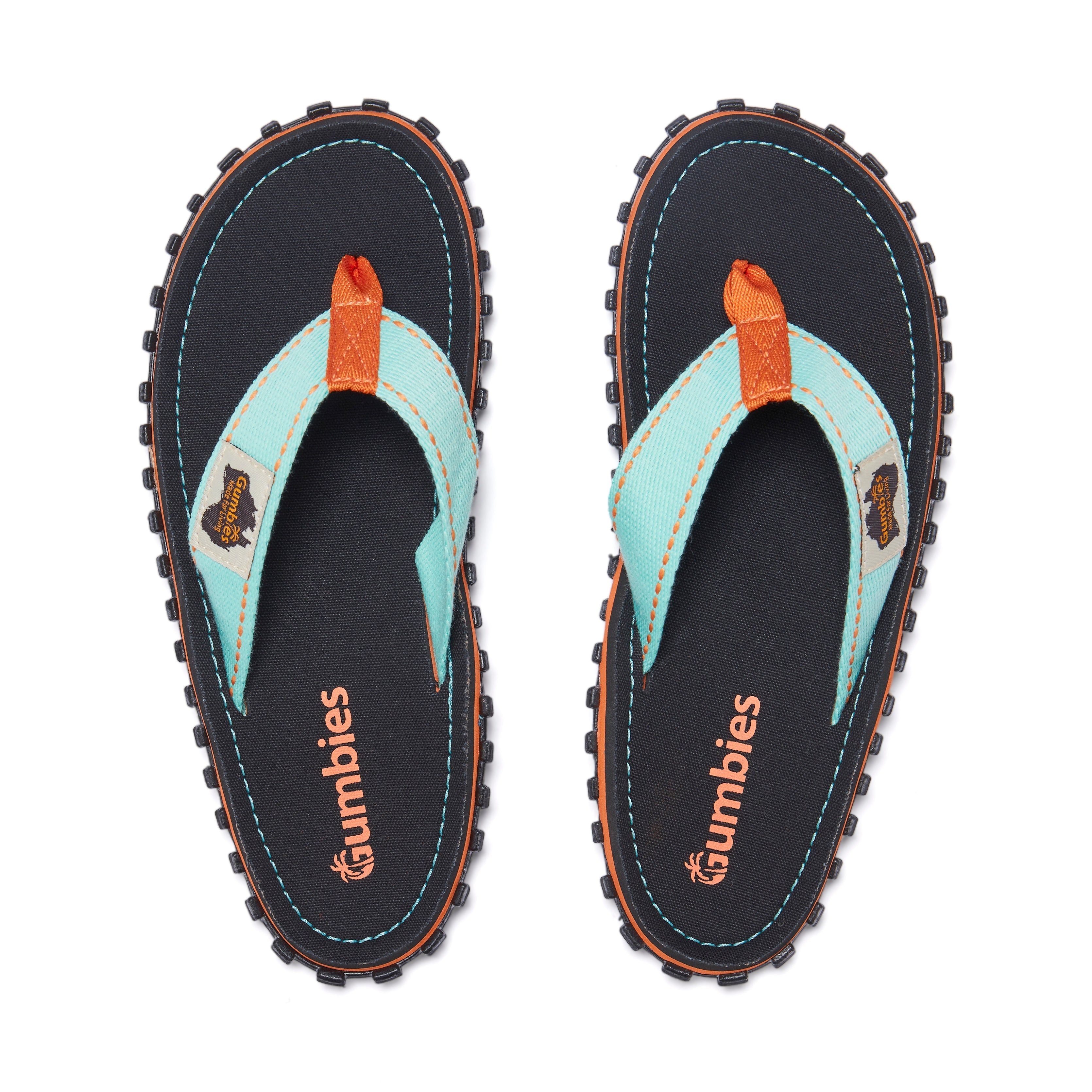 Pair of Gumbies sandals on a white background