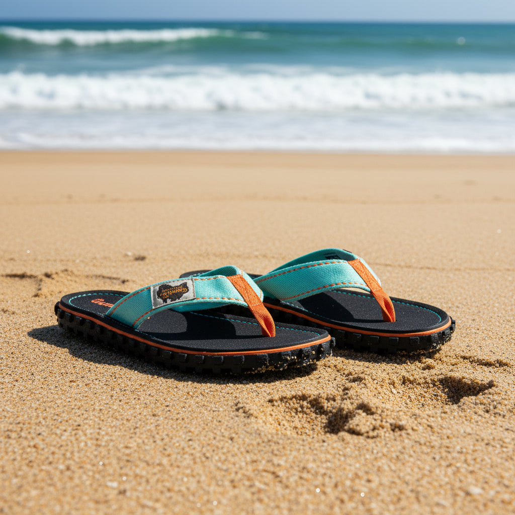 Pair of Gumbies sandals on a white background