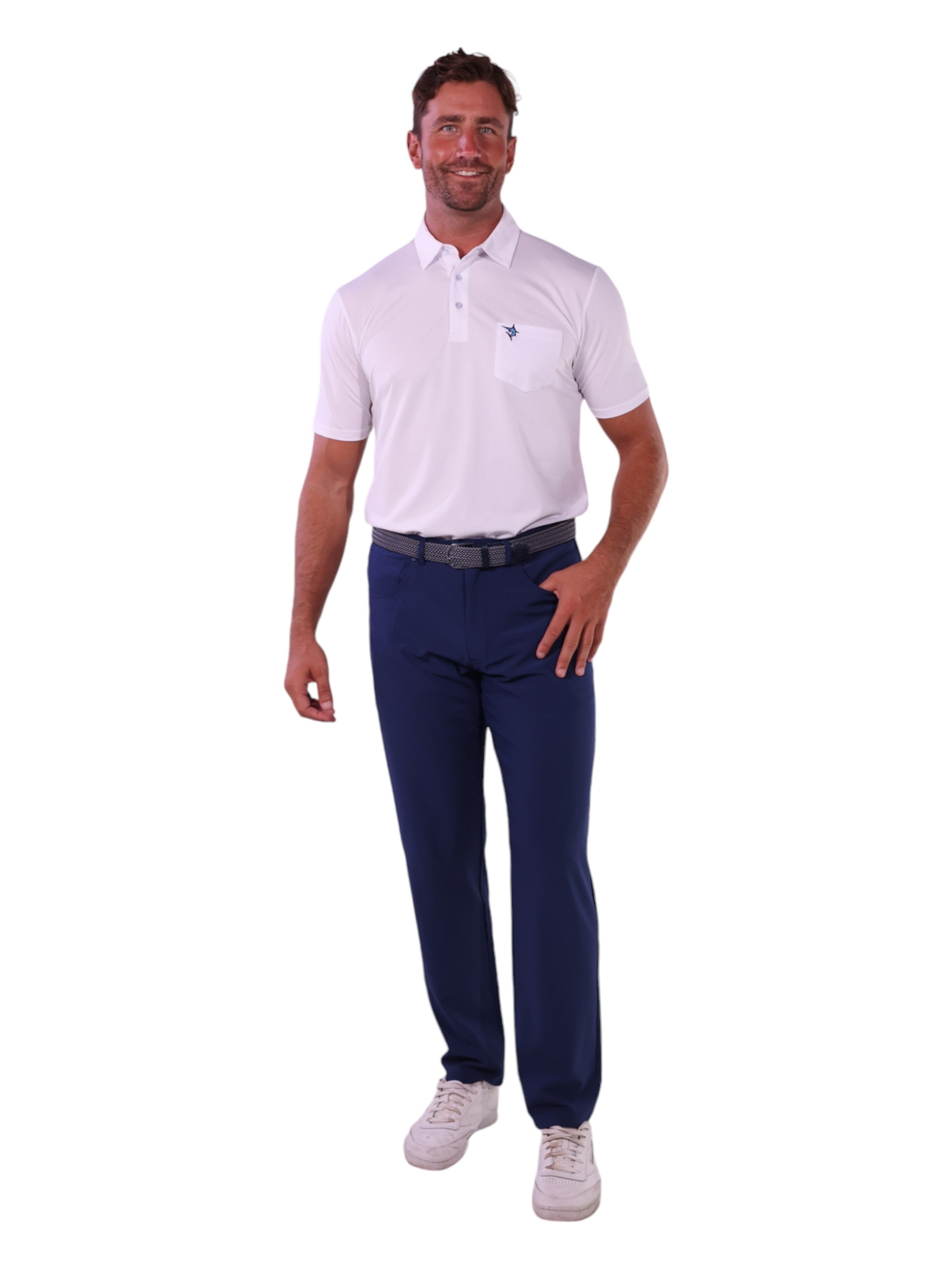 Man wearing a white polo shirt and navy pants on a white background