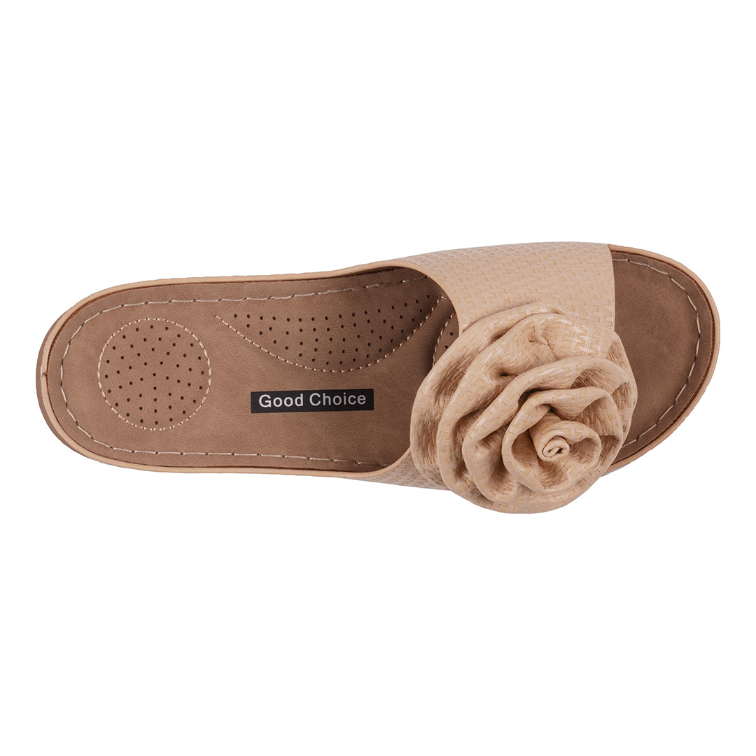 Beige sandal with a flower detail on a white background