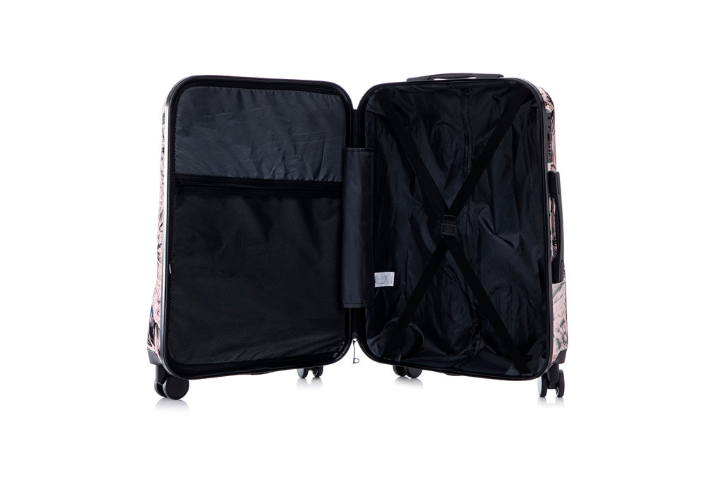 Open suitcase with floral pattern on a white background
