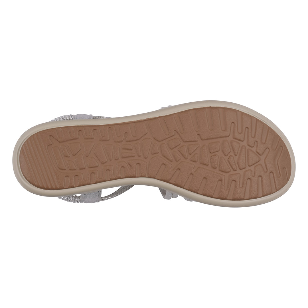 Close-up of a shoe sole with a textured pattern on a white background