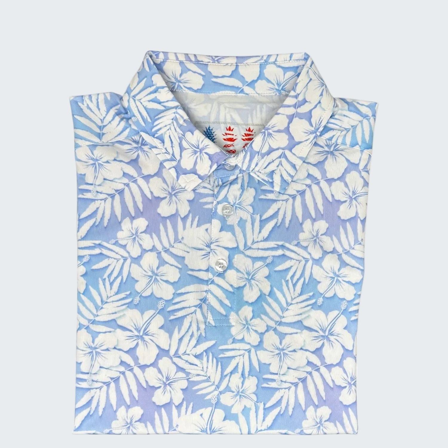 Blue and white floral patterned shirt with 10 Year Anniversary 2026 Limited Edition text.