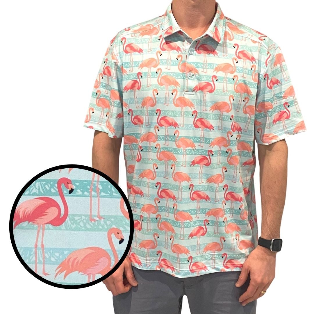 Person wearing a shirt with pink flamingo pattern, close-up of pattern shown.
