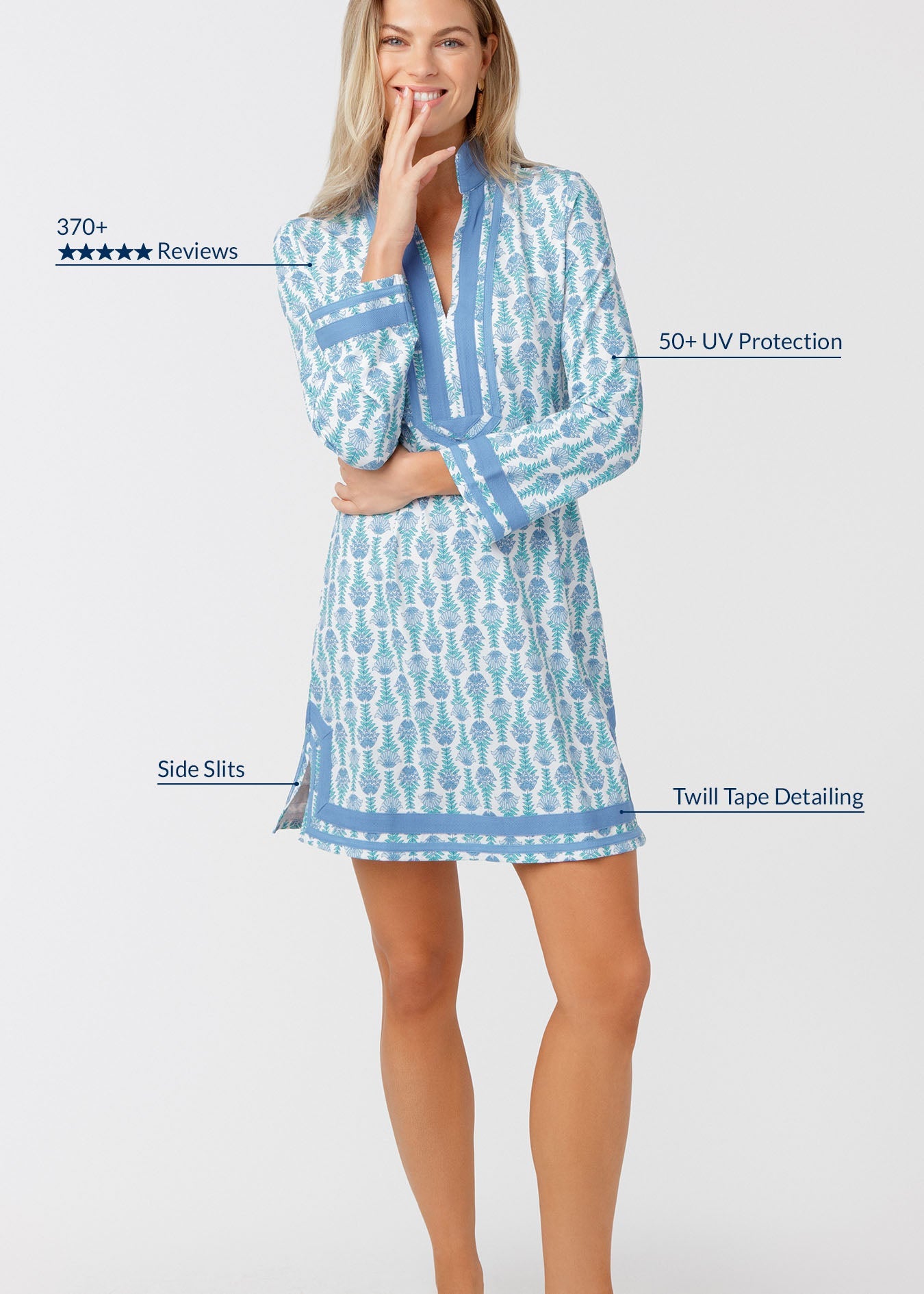 Woman wearing a blue and white patterned dress with text highlighting features on a white background