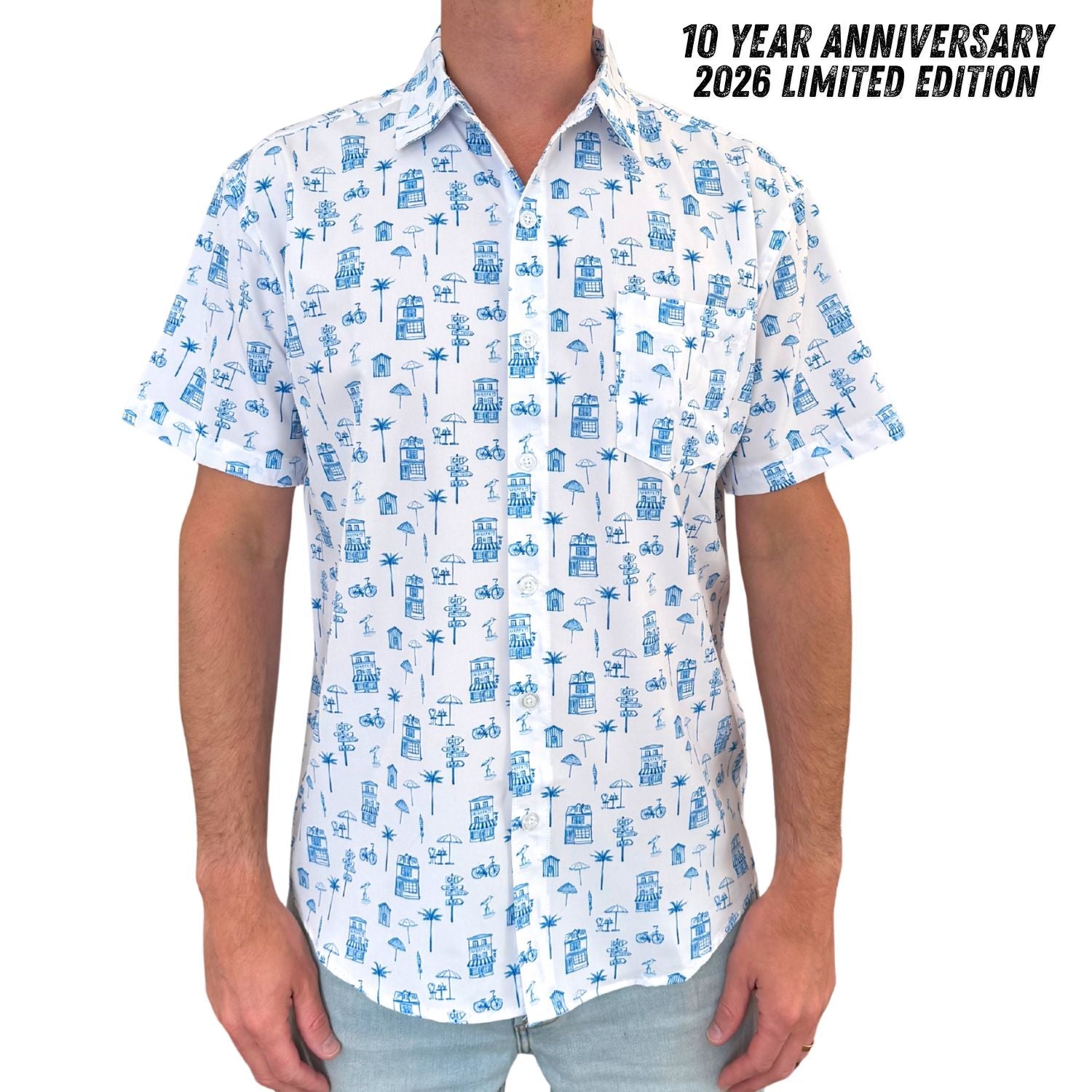 Person wearing a white shirt with blue patterns and '10 Year Anniversary 2026 Limited Edition' text.