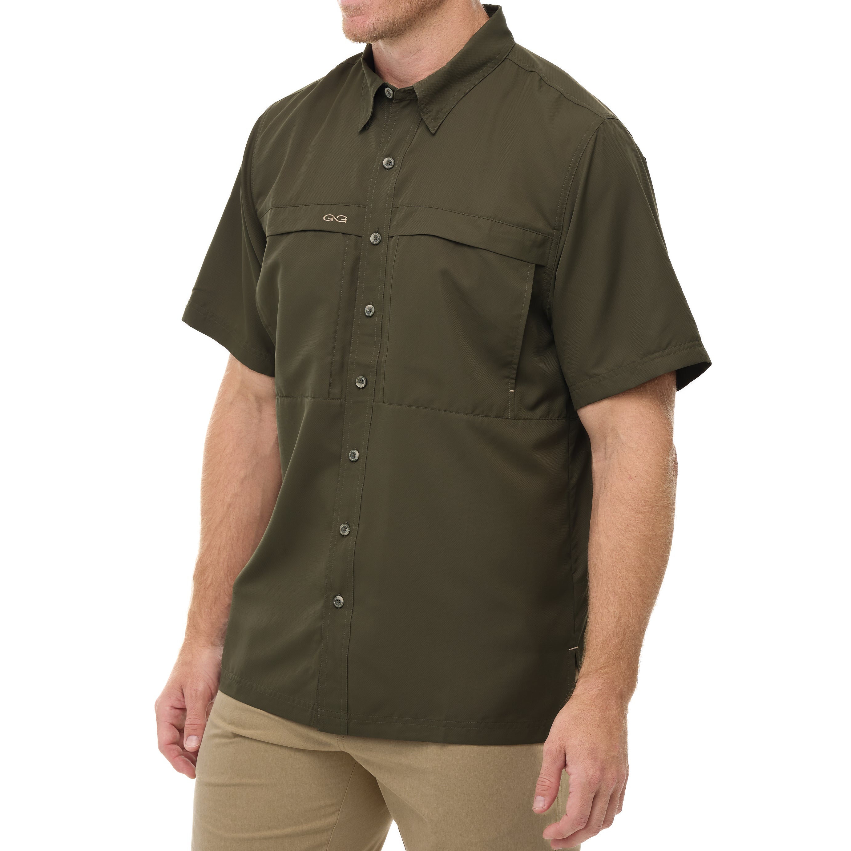 Man wearing a green short-sleeve shirt with button details on a white background