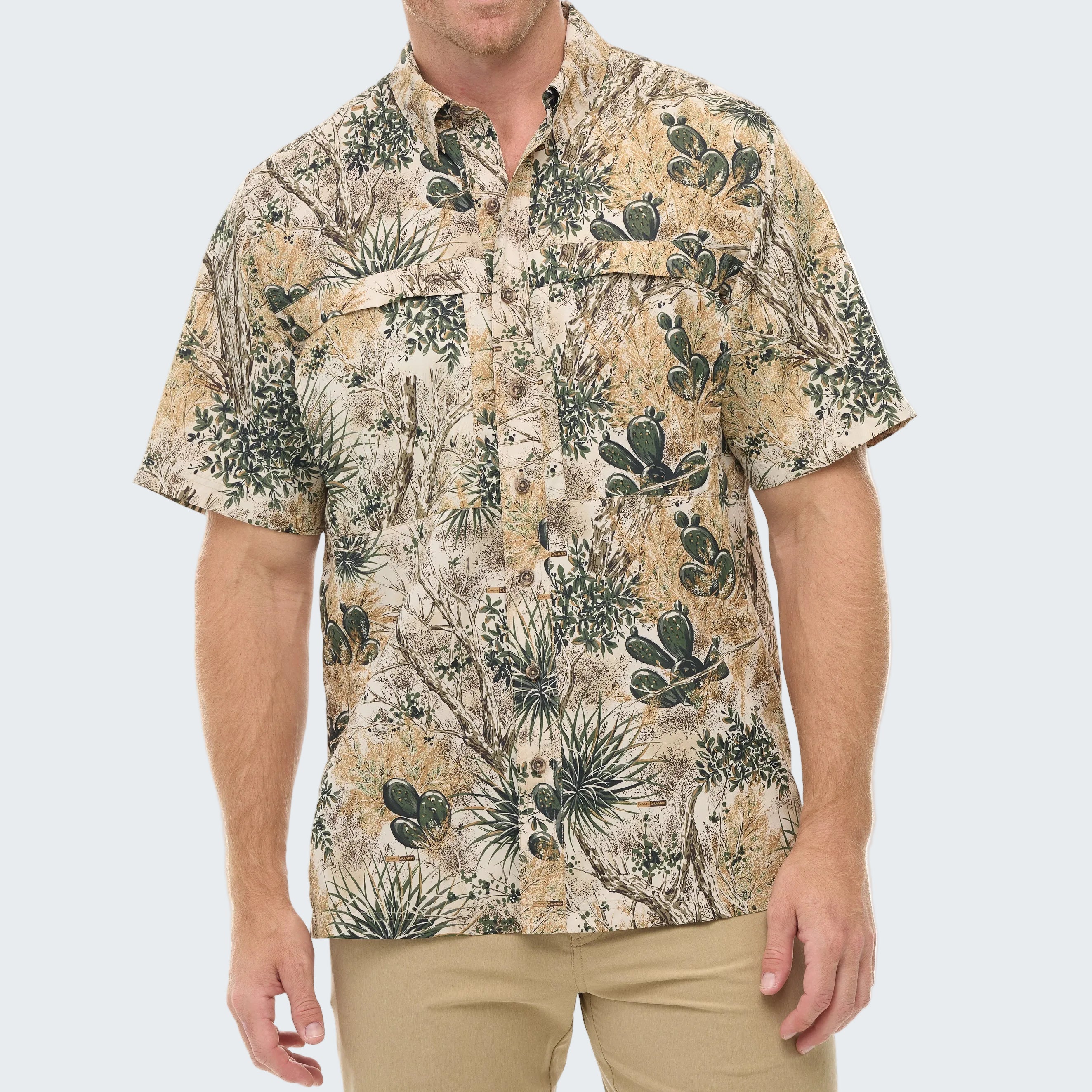 Man wearing a patterned shirt with cactus design on a white background