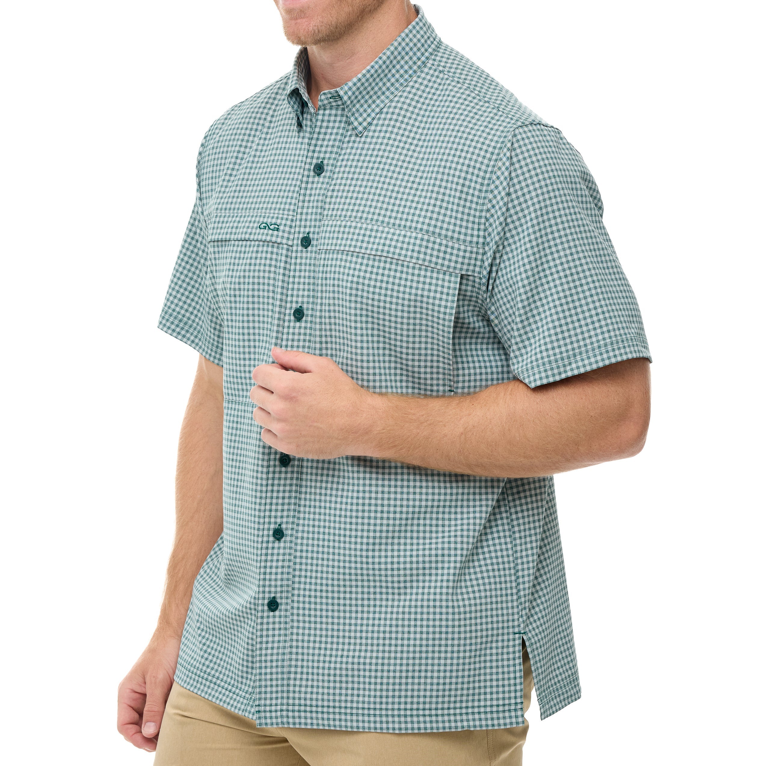 Man wearing a green checkered shirt on a white background