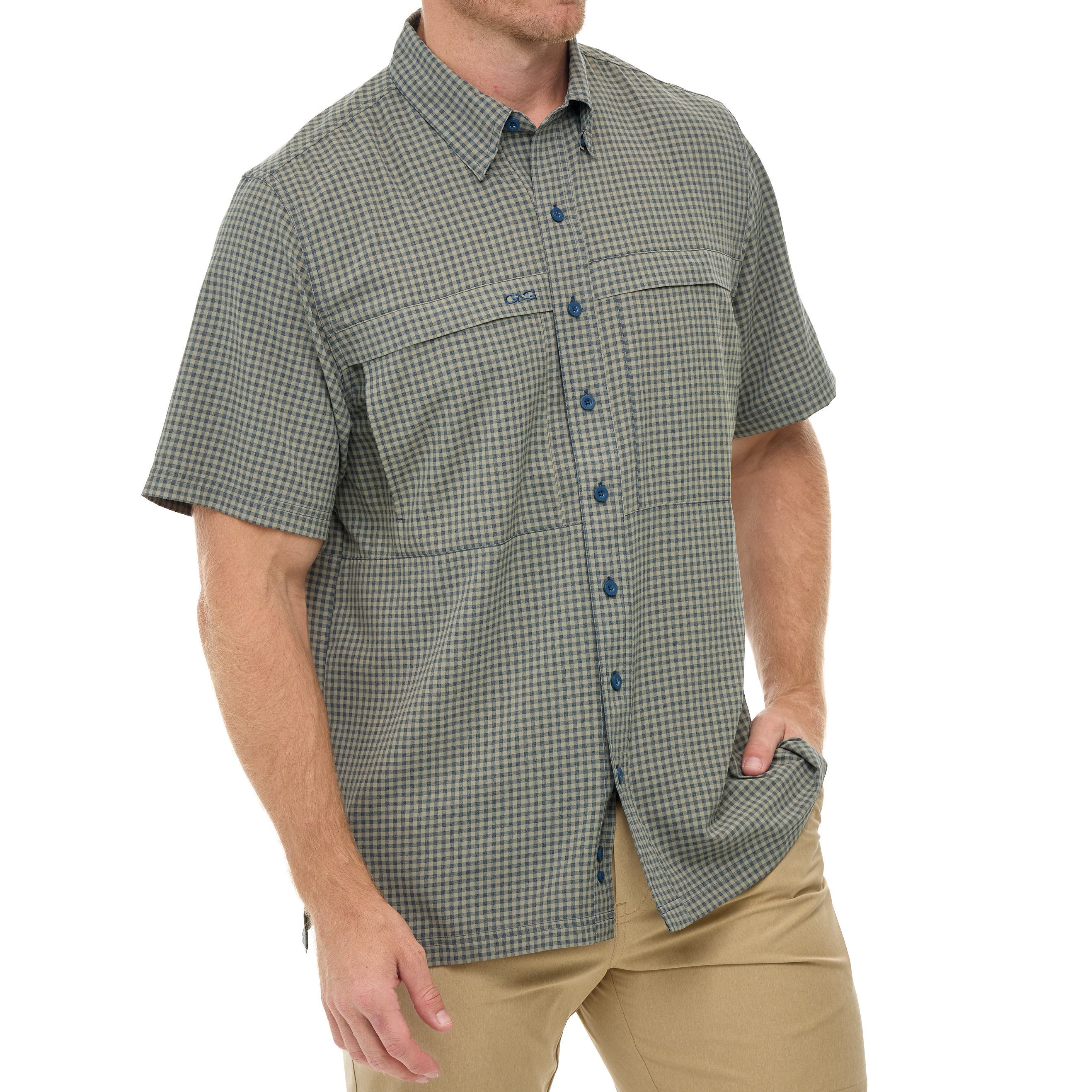 Man wearing a green checkered short-sleeve shirt on a white background