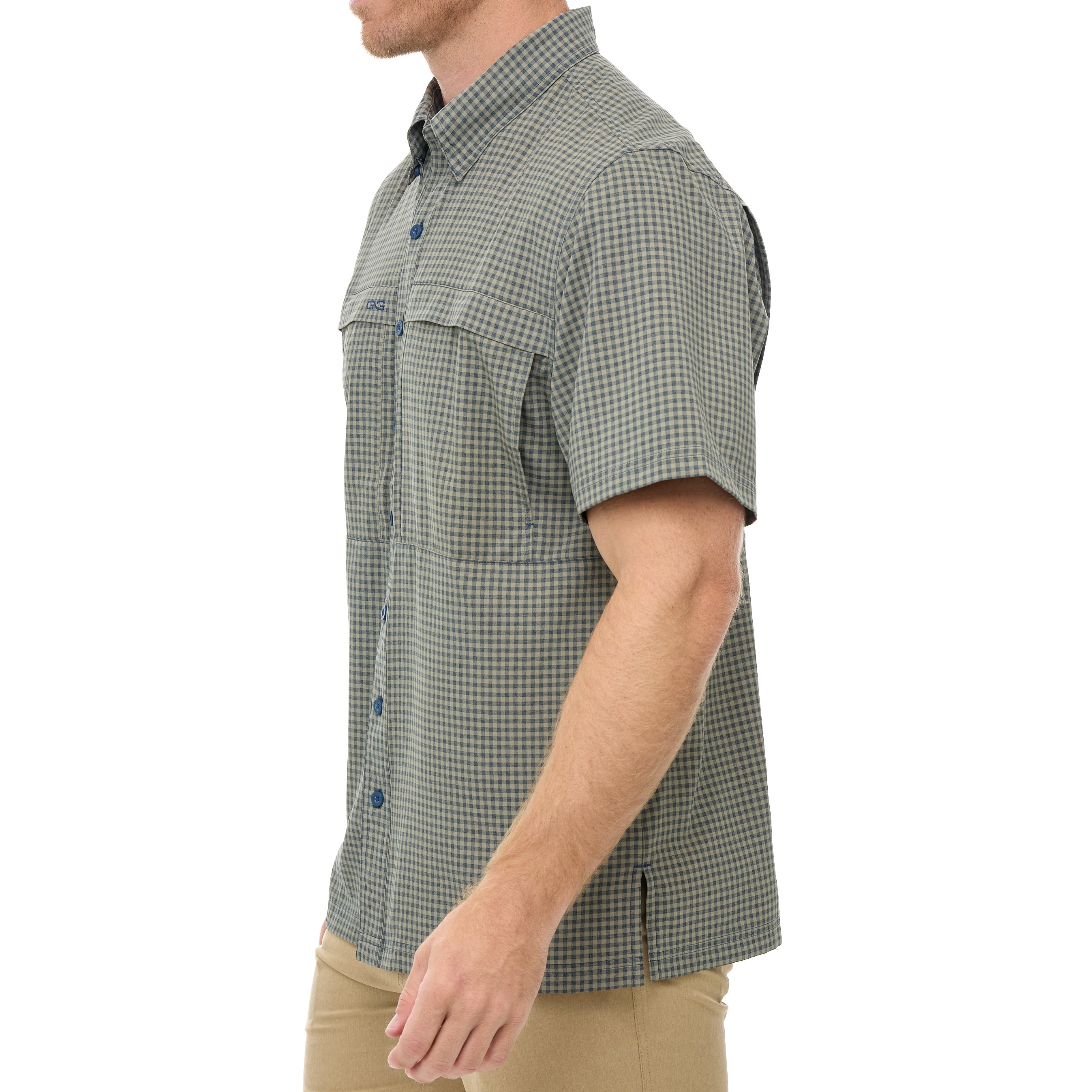 Man wearing a green checkered short-sleeve shirt on a white background