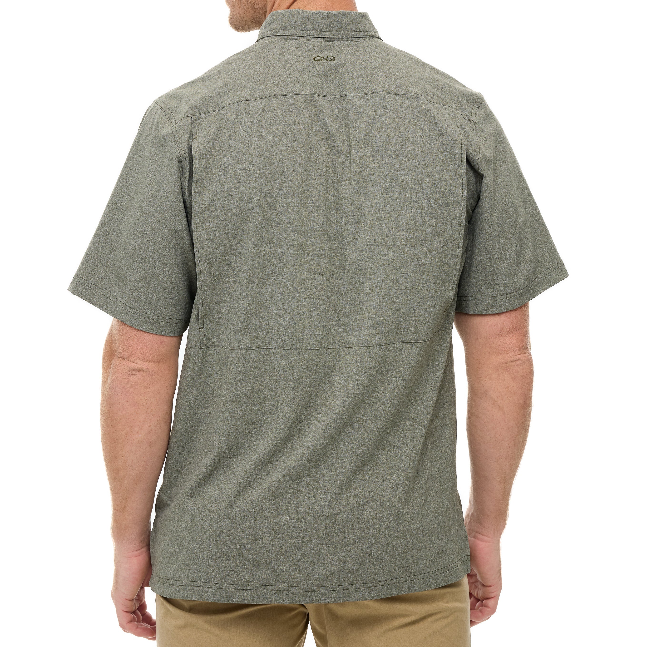 Person wearing a green short-sleeve shirt on a white background