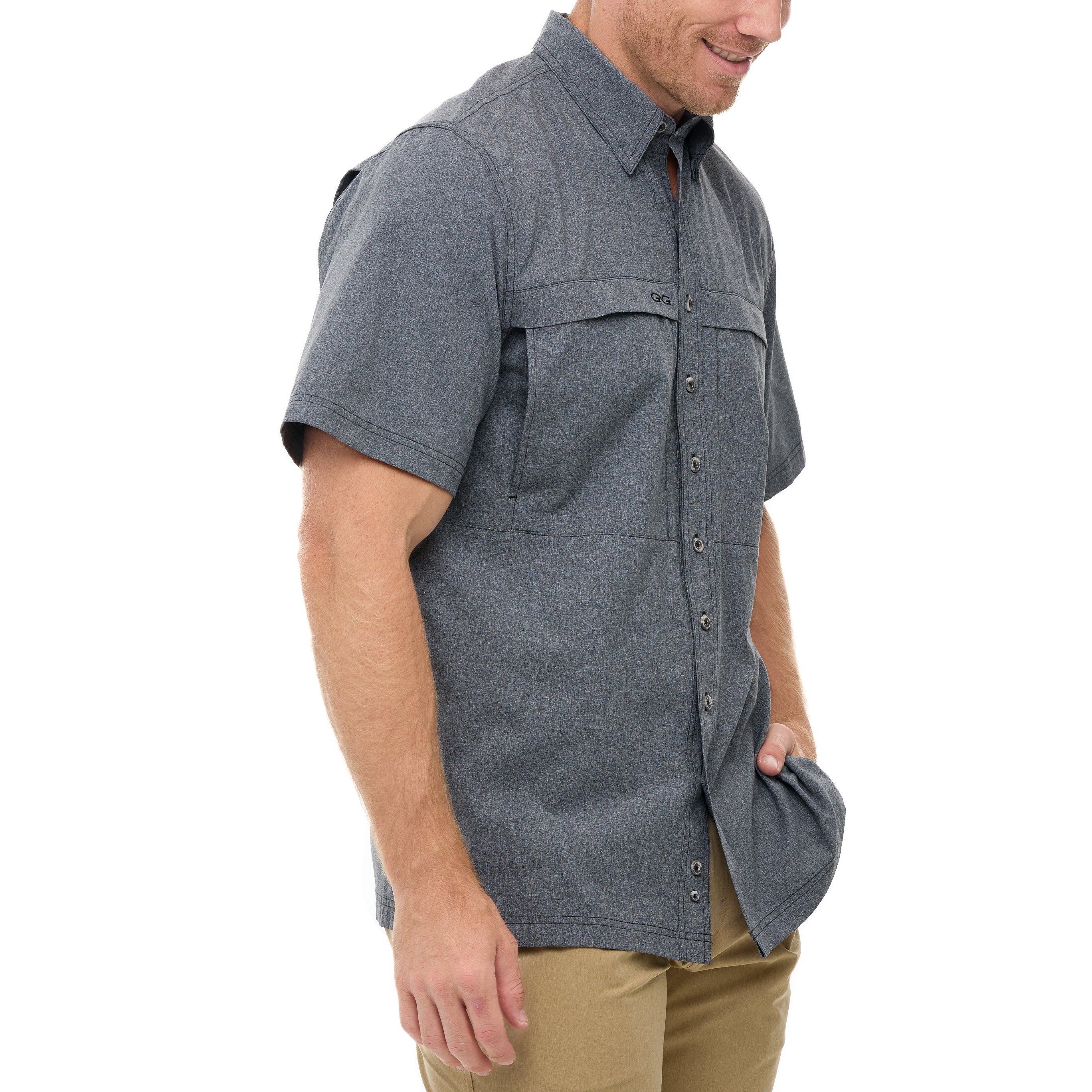Man wearing a gray short-sleeve shirt on a white background