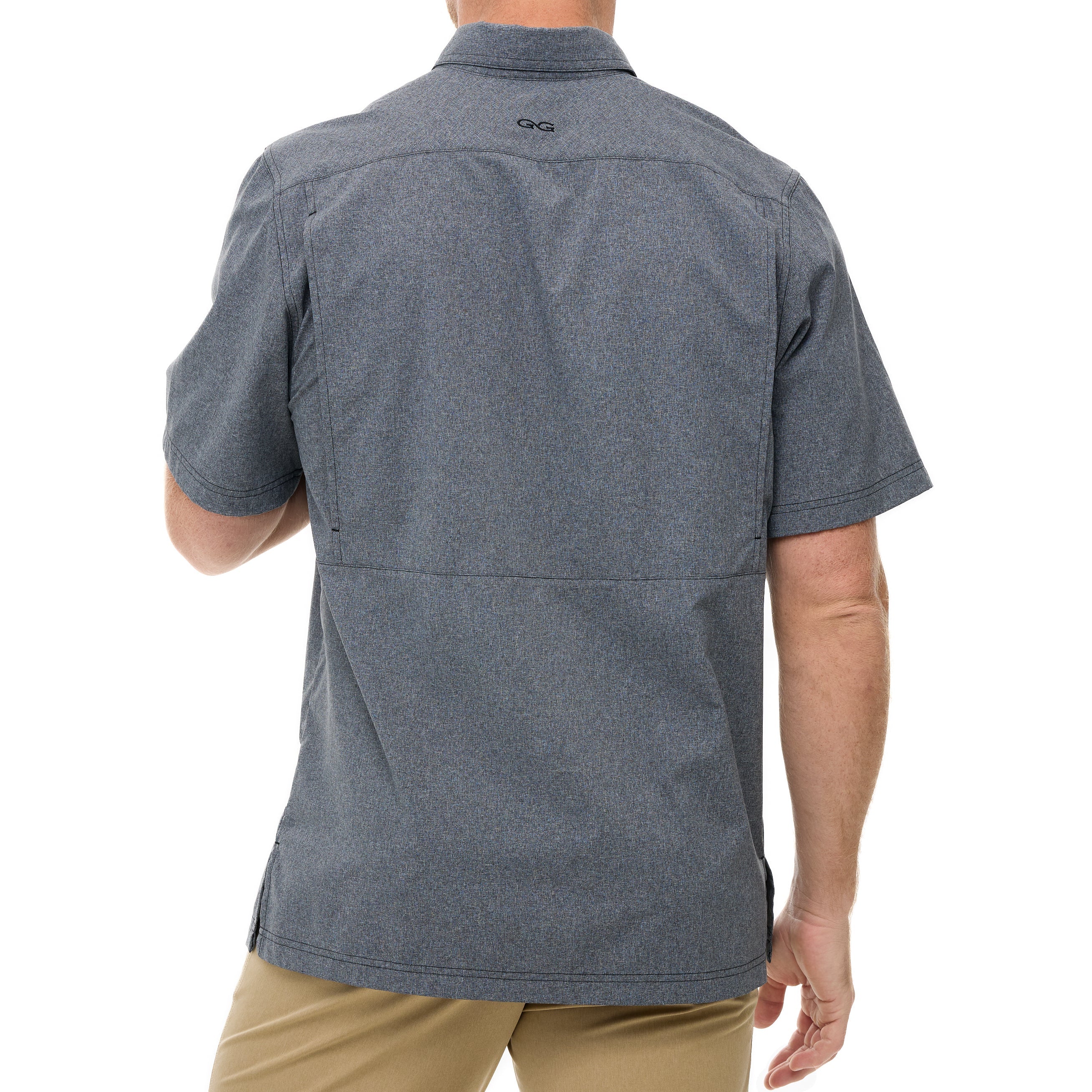 Person wearing a gray short-sleeve shirt with a visible brand logo on the back, standing against a white background.
