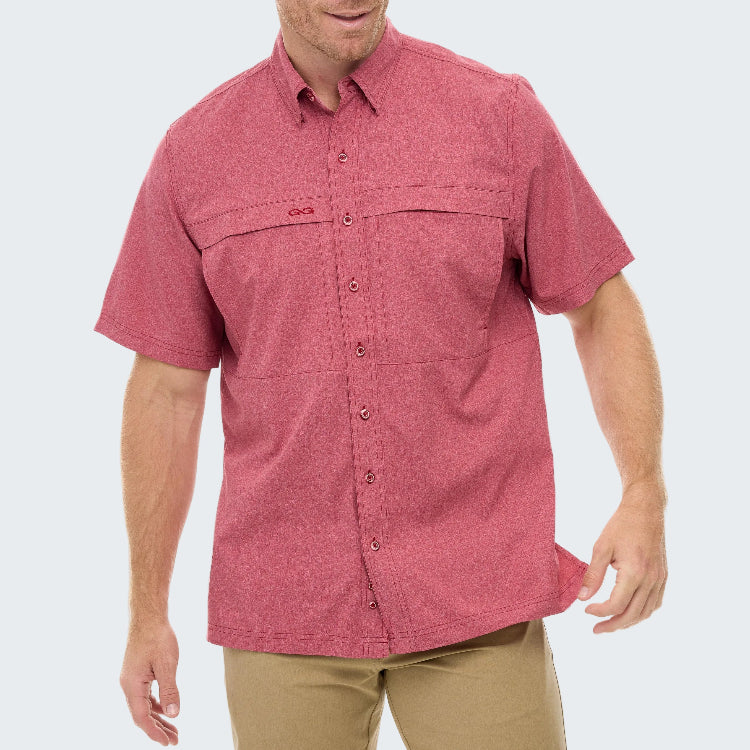Man wearing a red short-sleeve shirt with a visible brand logo on a white background