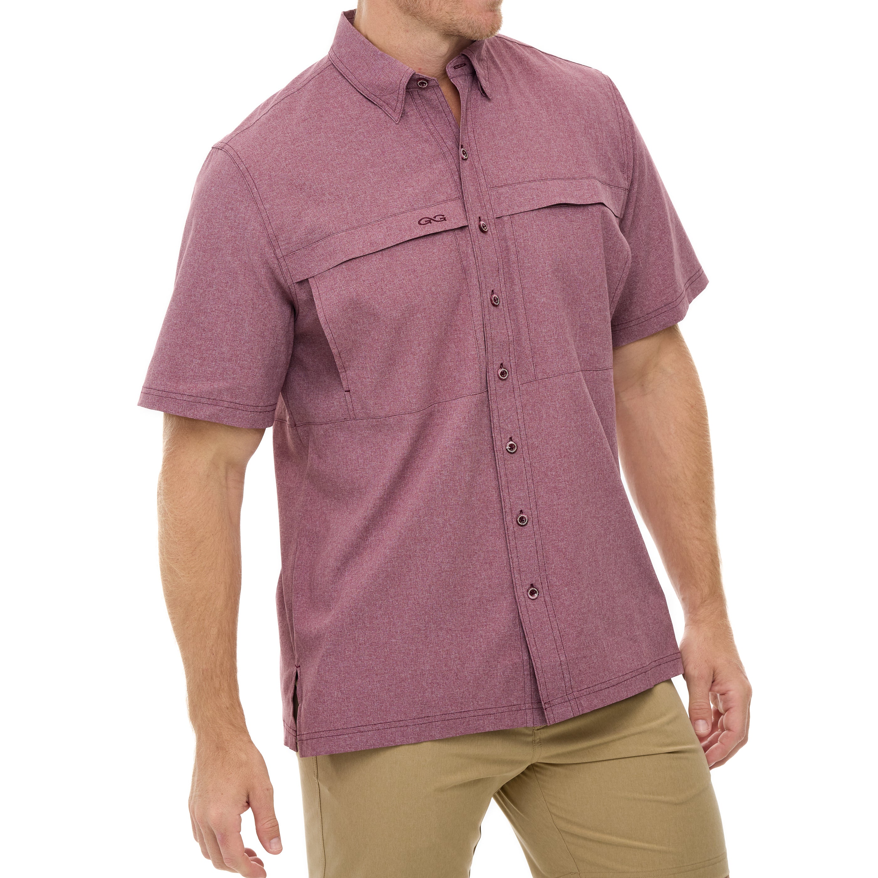 Man wearing a maroon short-sleeve shirt with pockets on a white background