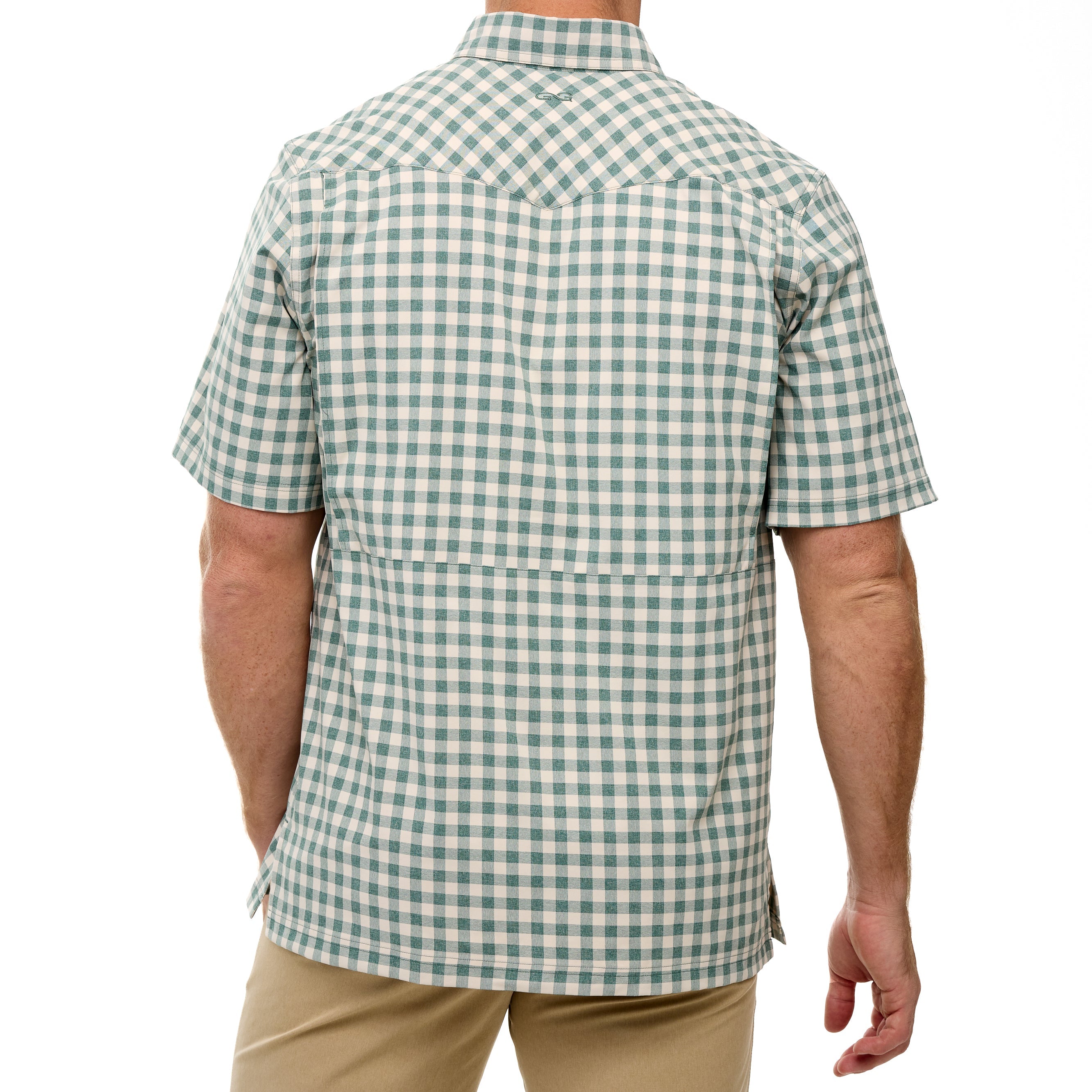 Green and white checkered shirt worn by a person on a white background