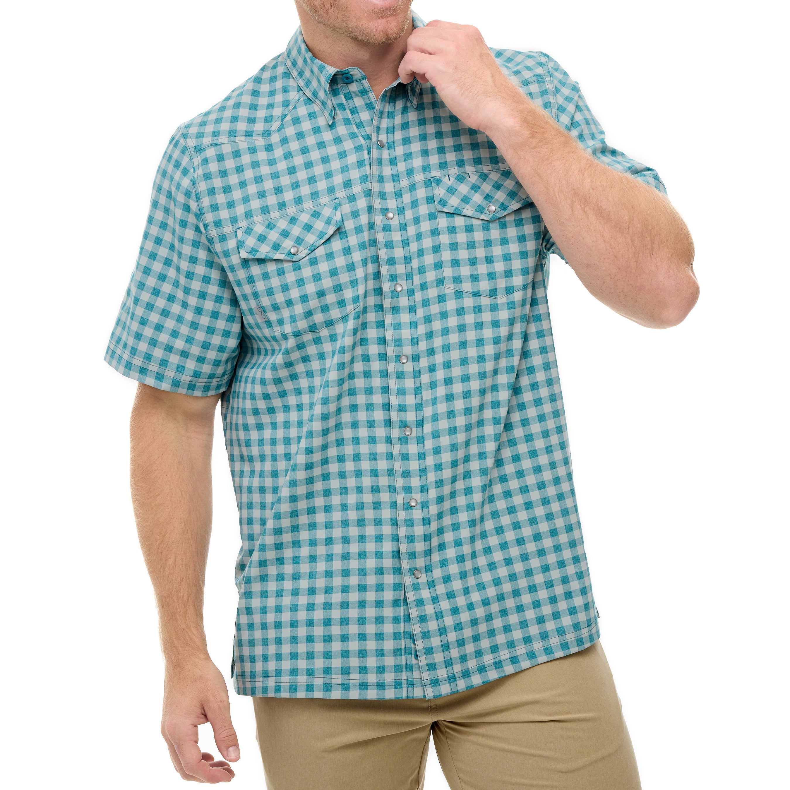 Man wearing a blue and green checkered shirt on a white background