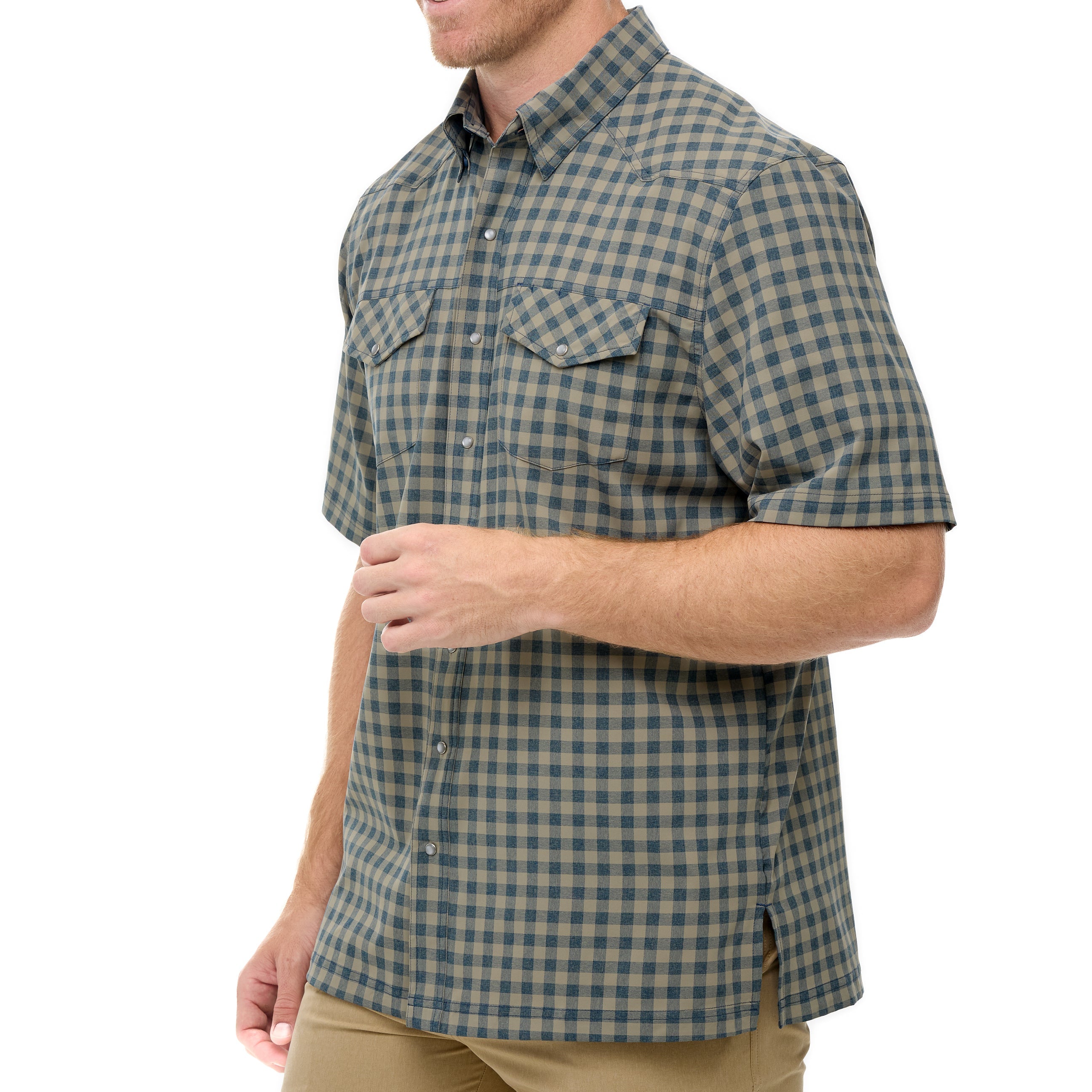 Man wearing a green and blue checkered shirt on a white background