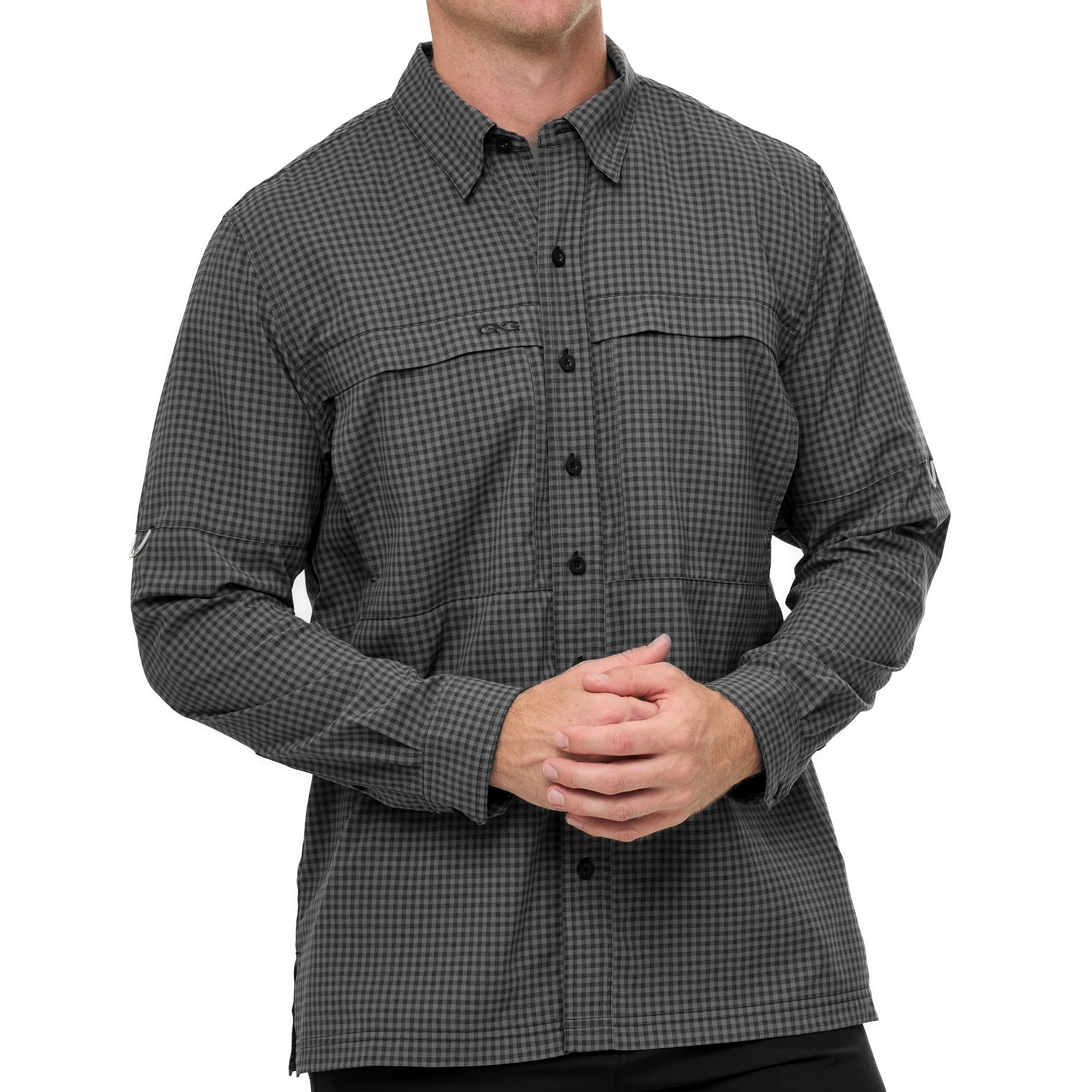 Person wearing a black and gray checkered shirt on a white background