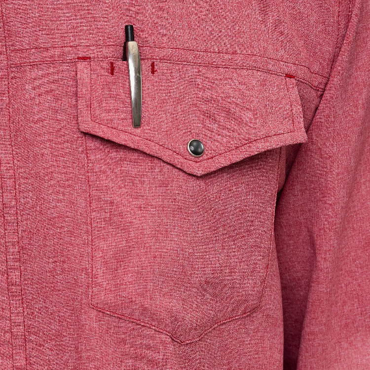 Close-up of a red shirt pocket with a pen inside