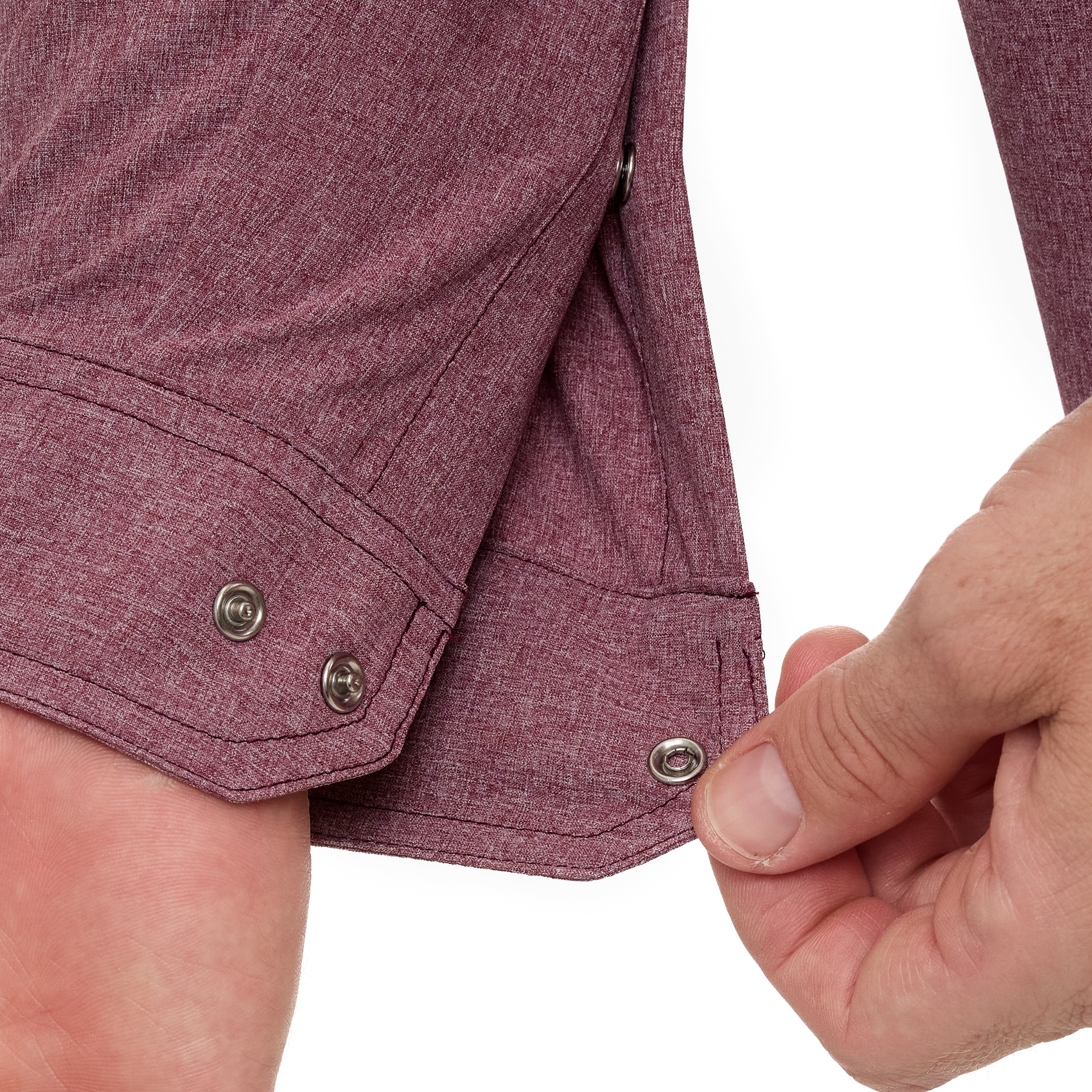 Close-up of a person buttoning a maroon jacket on a white background