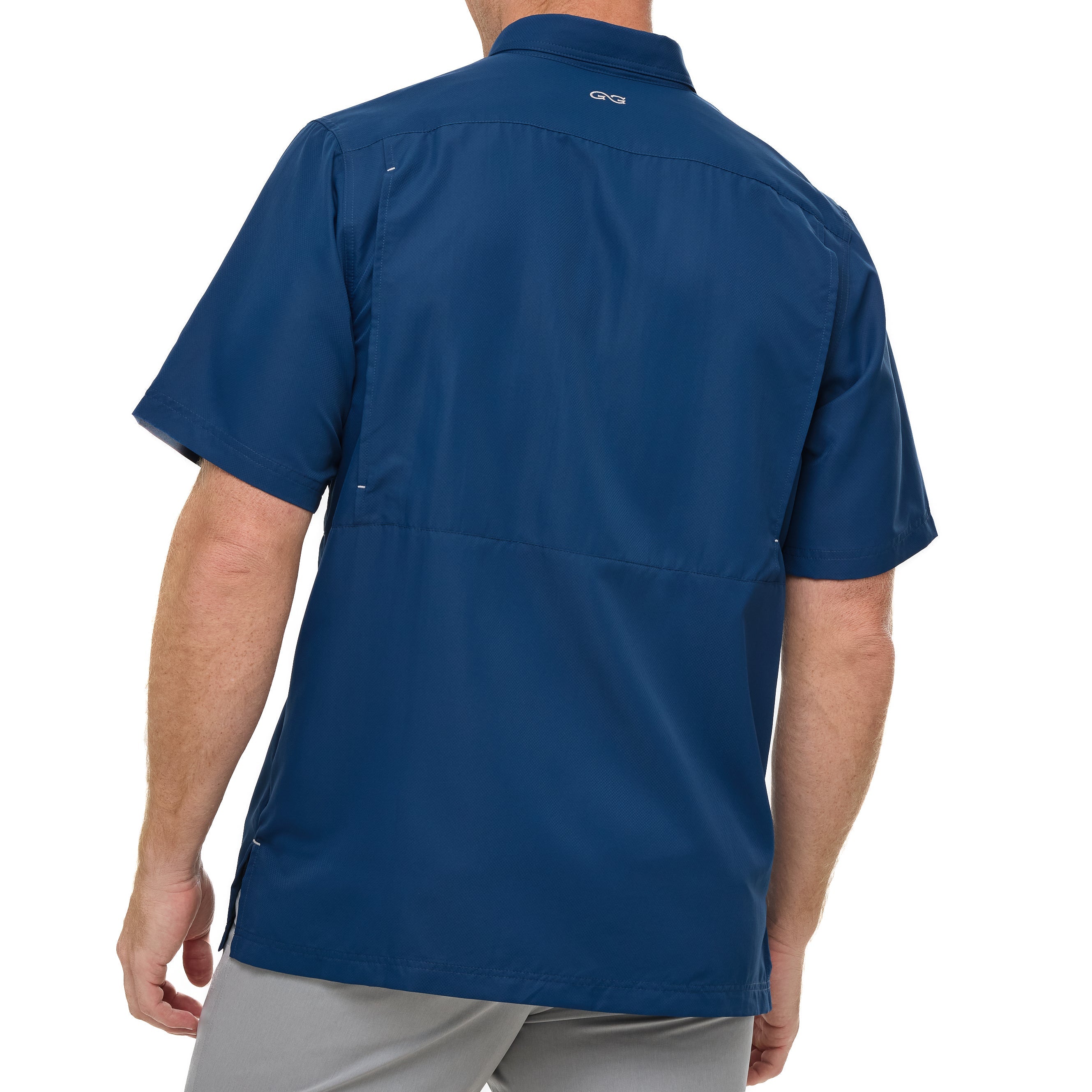 Blue short-sleeve shirt worn by a person on a white background