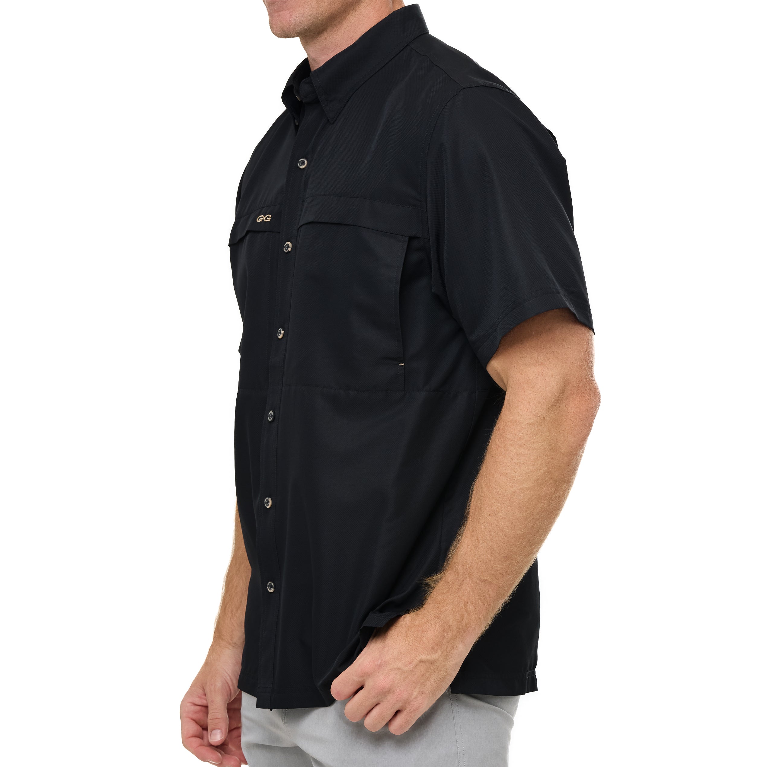 Black short-sleeve shirt worn by a person on a white background