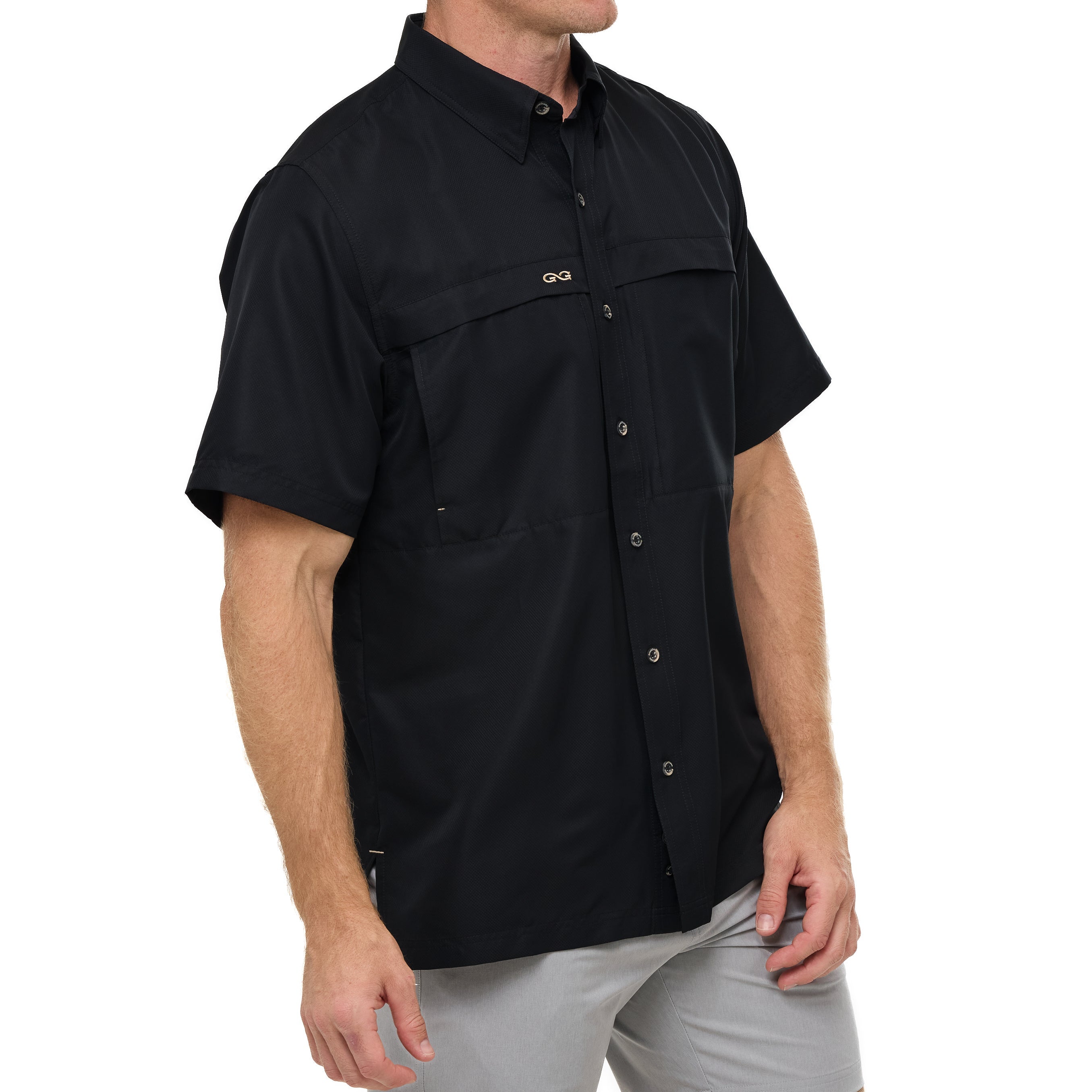 Black short-sleeve shirt worn by a person on a white background