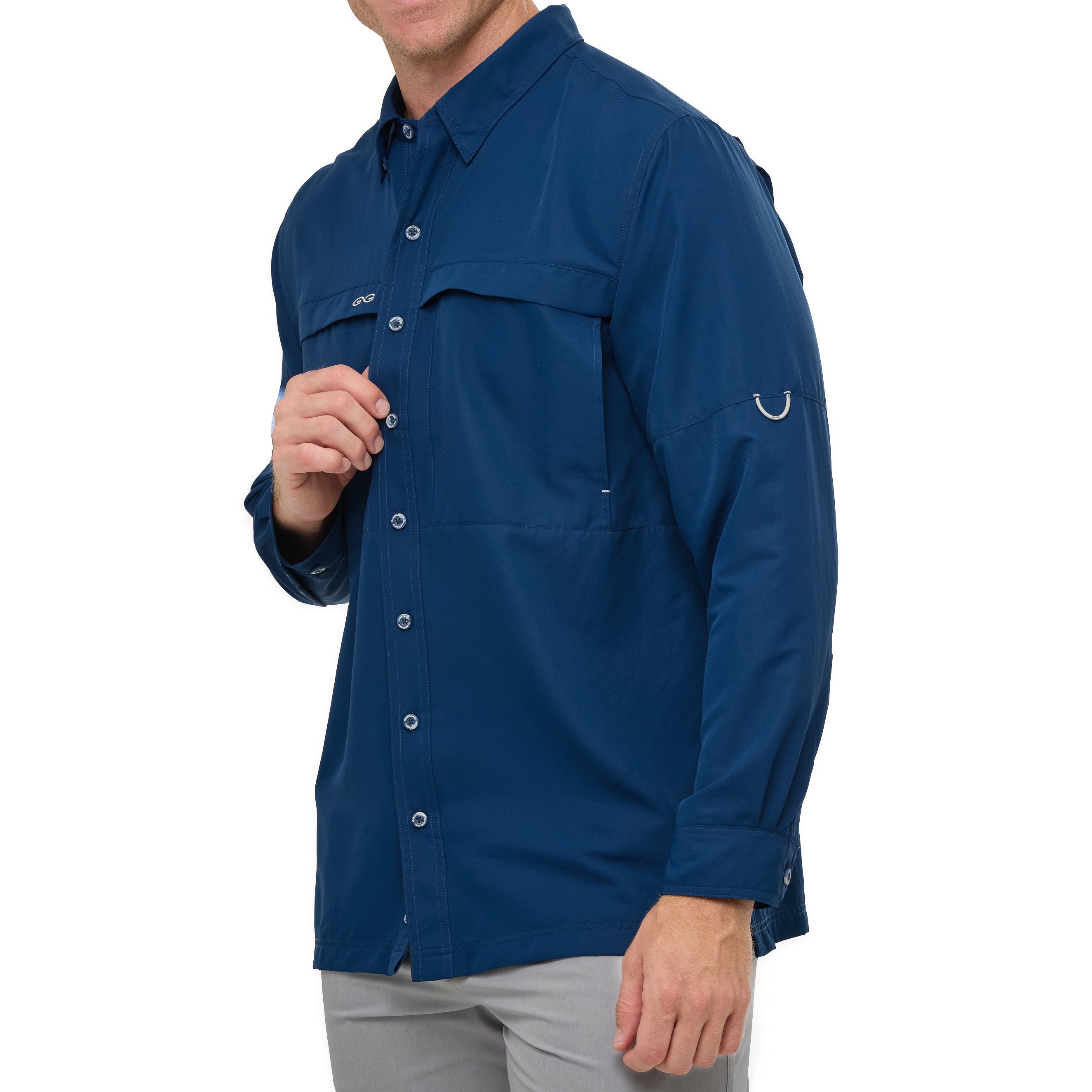 Blue shirt with rolled-up sleeves worn by a person on a white background