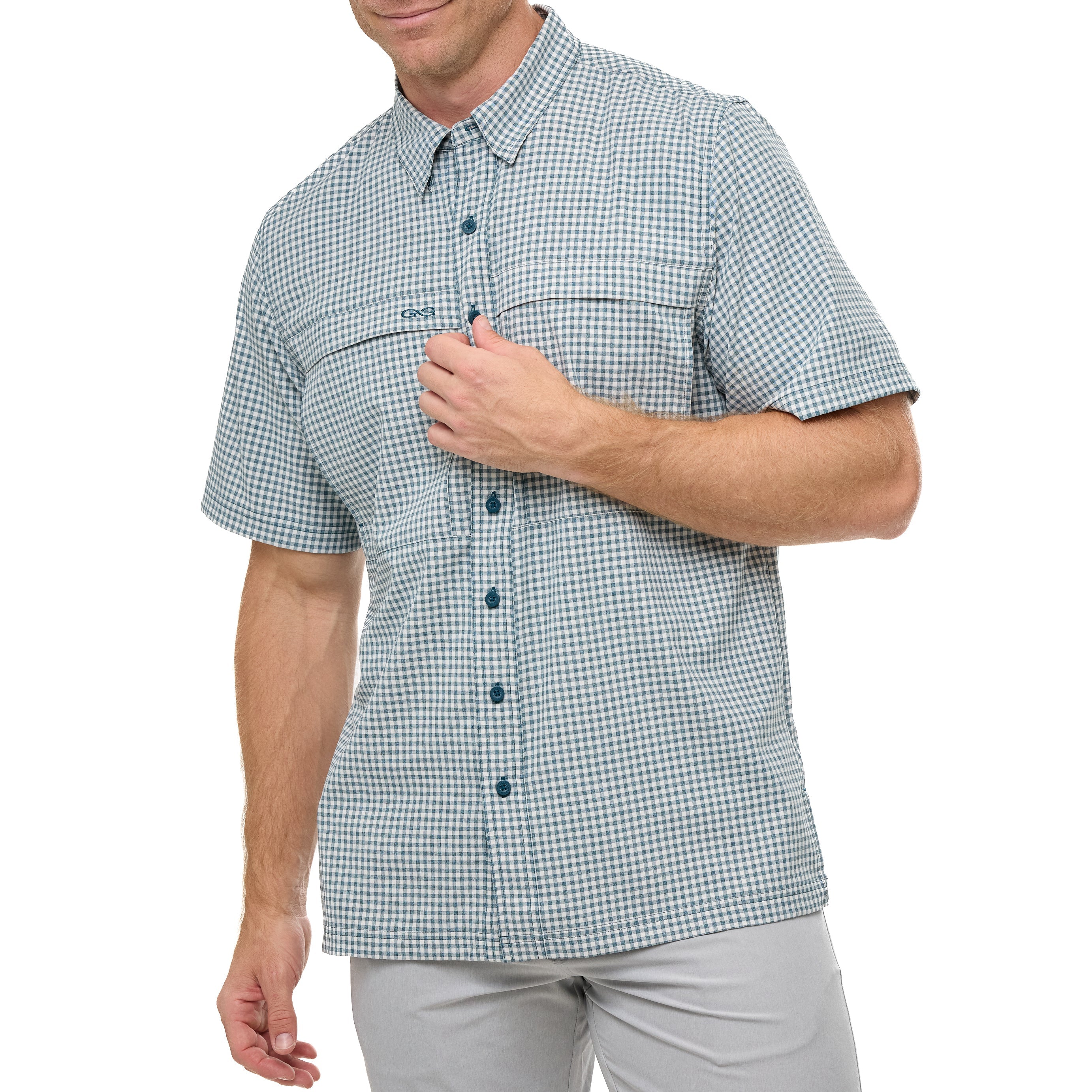 Man wearing a green and white checkered short-sleeve shirt on a white background