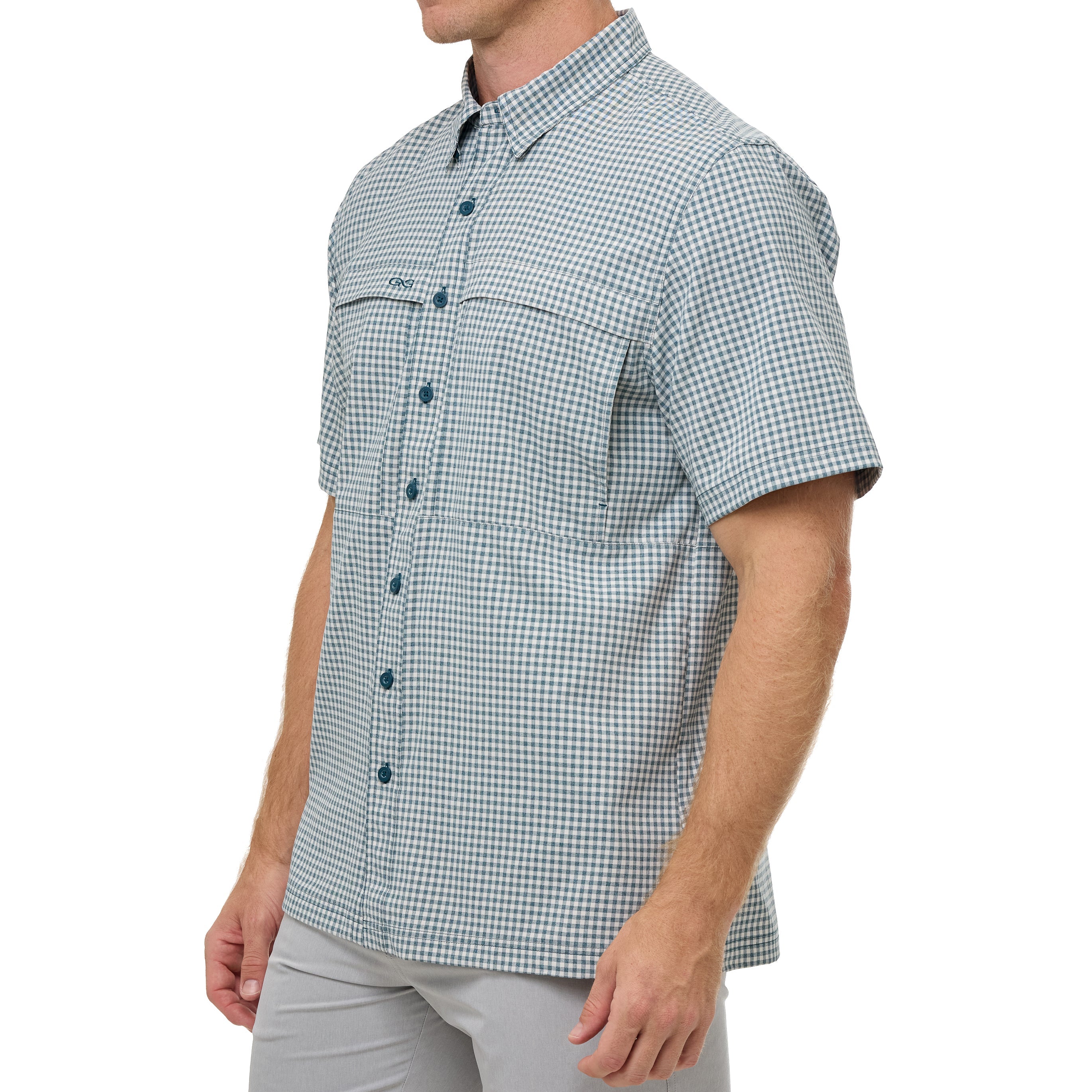 Man wearing a green and white checkered short-sleeve shirt on a white background