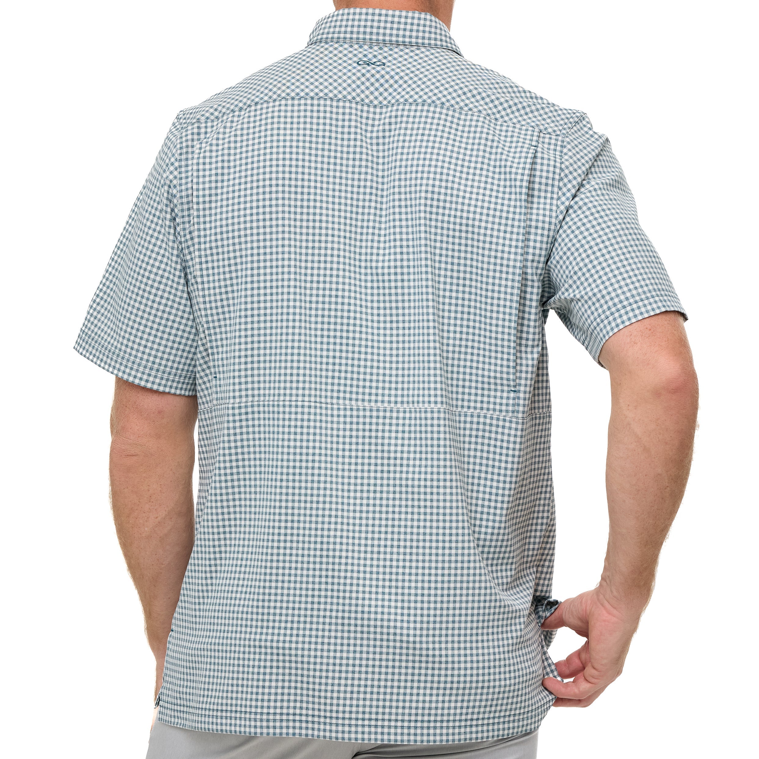 Person wearing a green and white checkered shirt on a white background