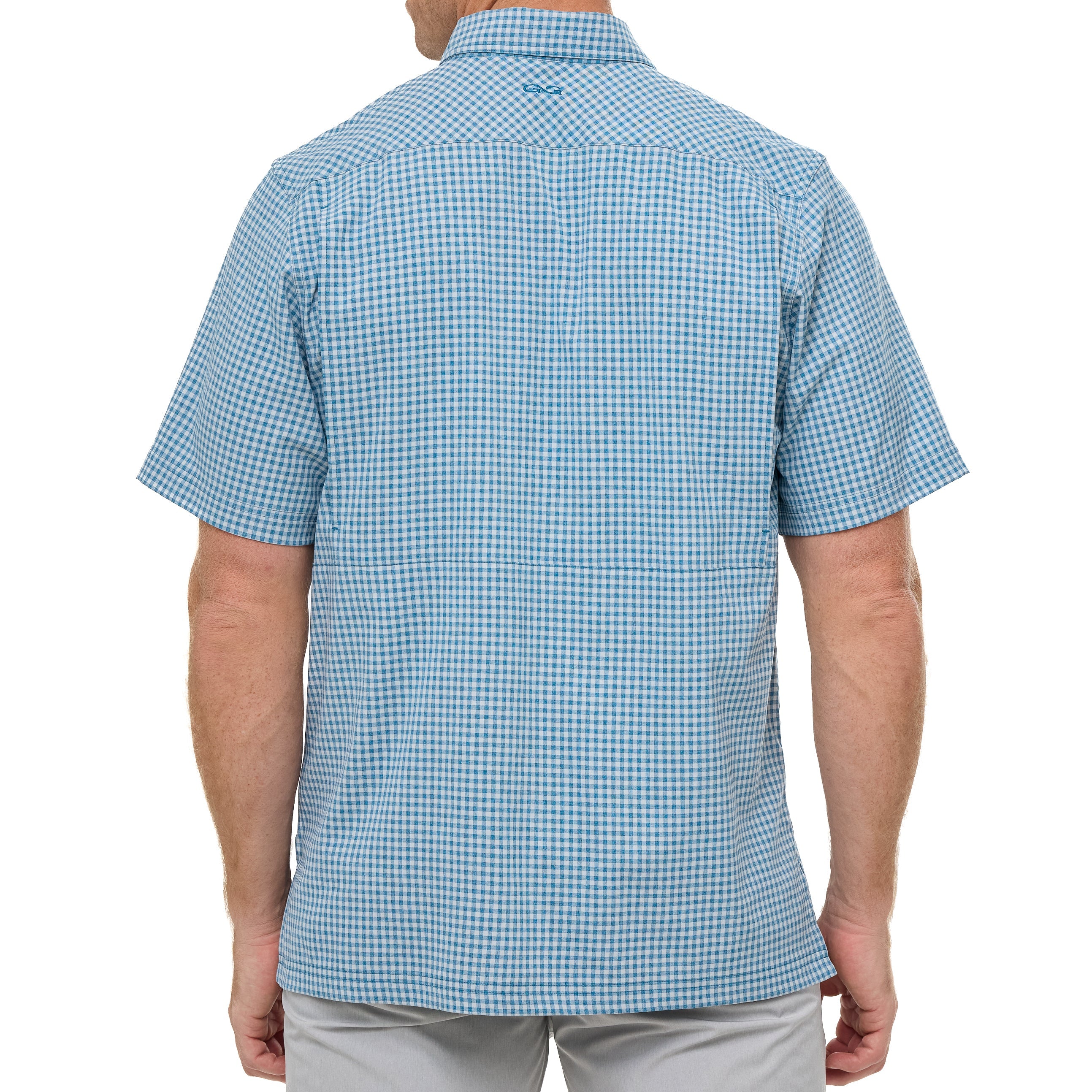 Back view of a person wearing a blue checkered shirt on a white background
