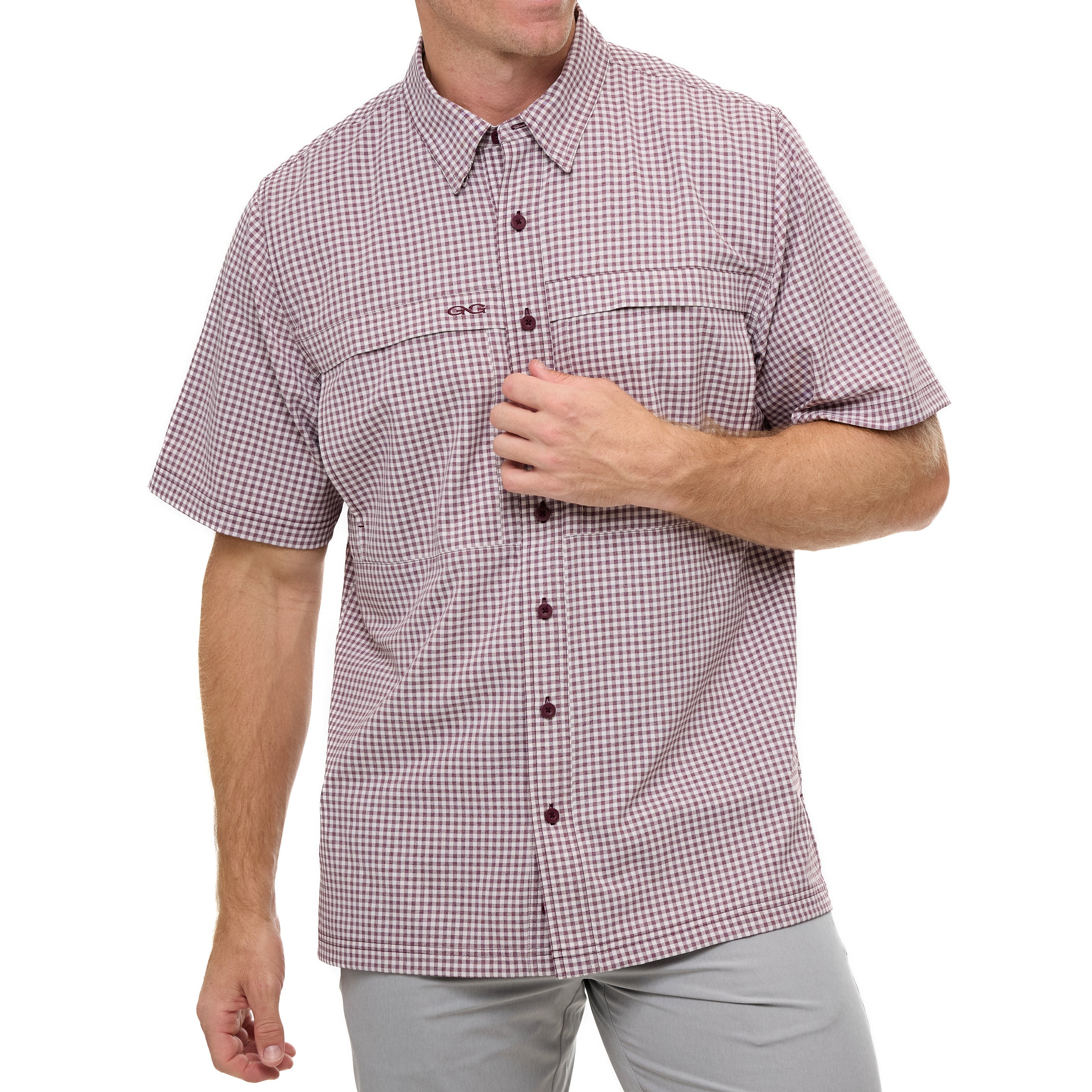Man wearing a red and white checkered short-sleeve shirt on a white background