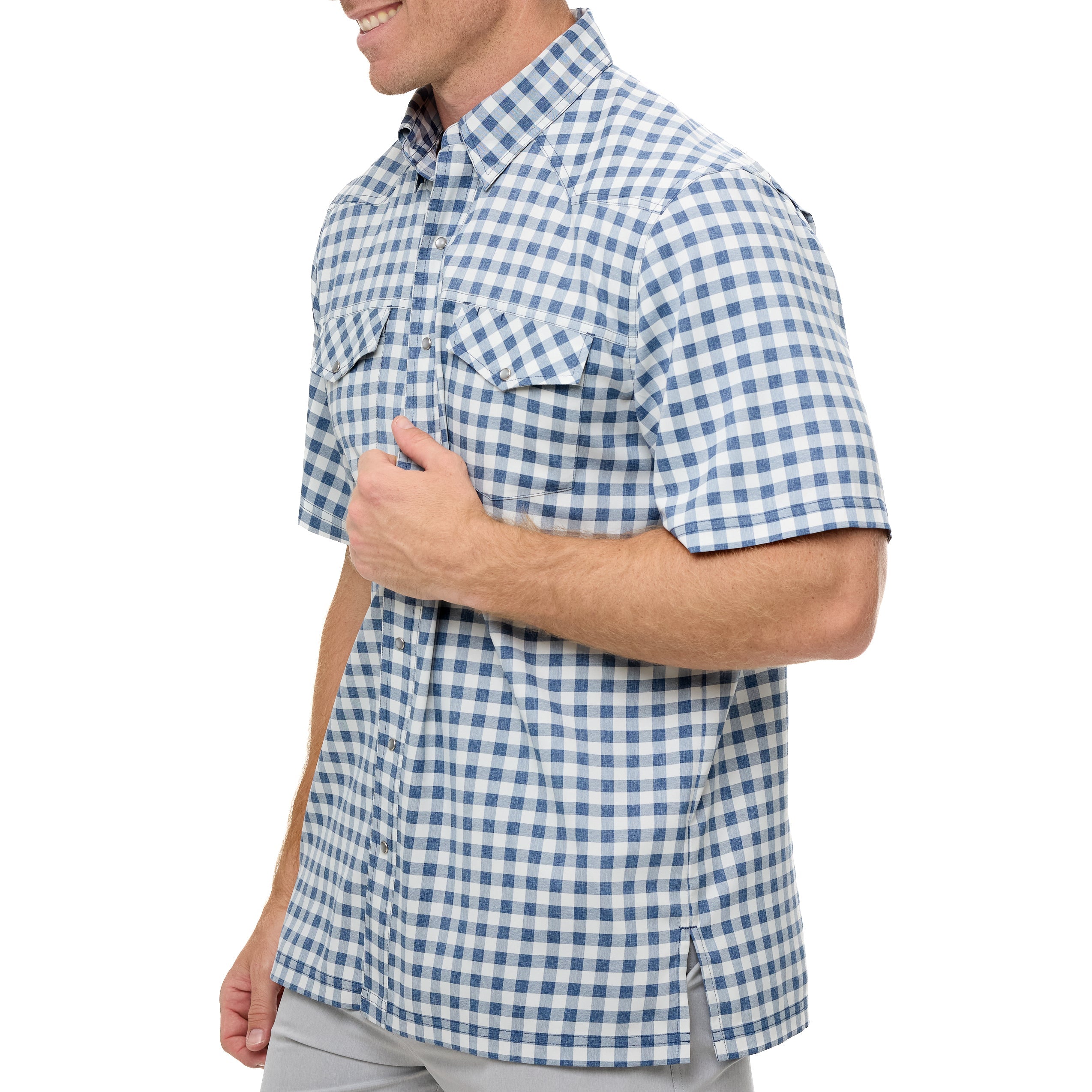 Man wearing a blue and white checkered shirt on a white background