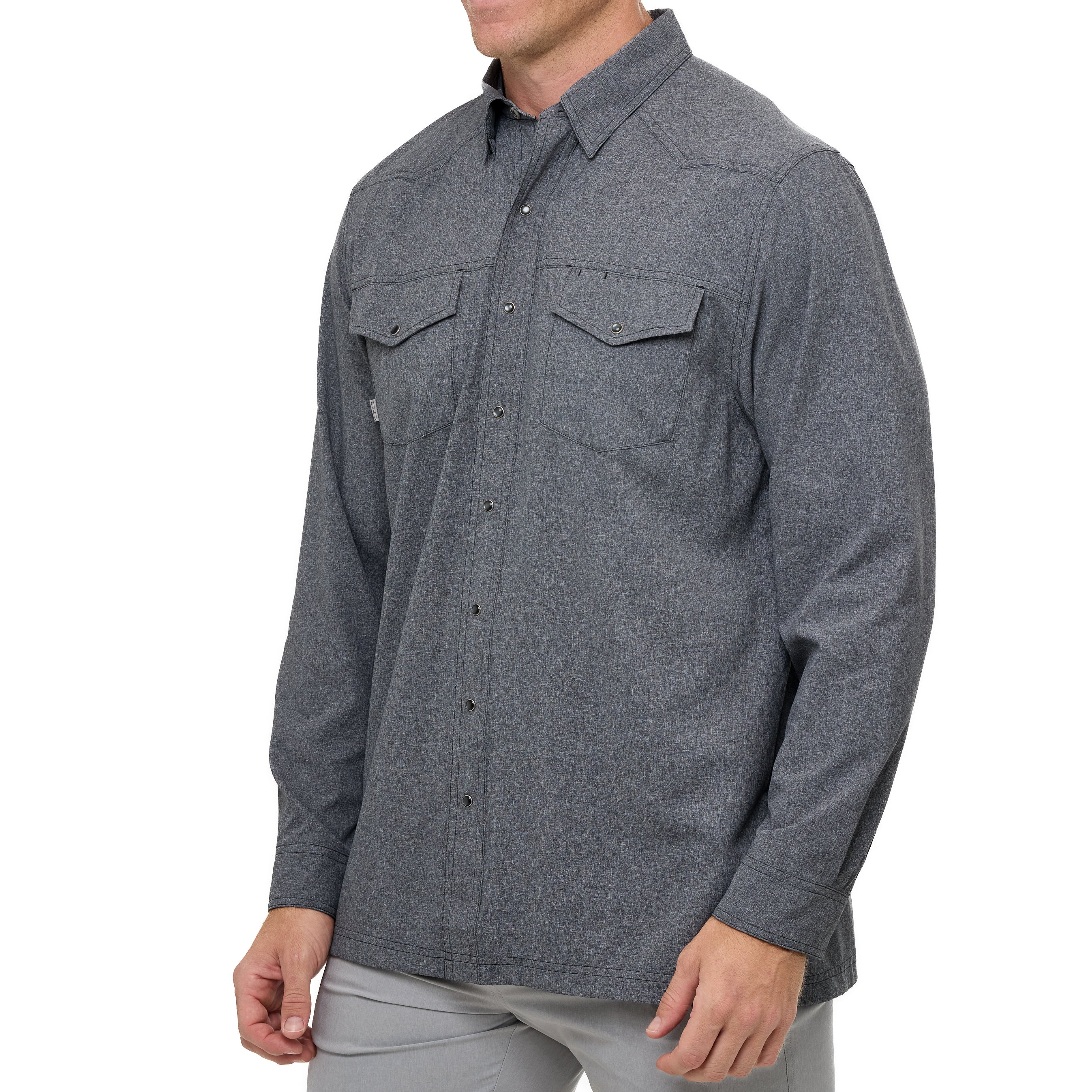 Gray button-up shirt worn by a person on a white background