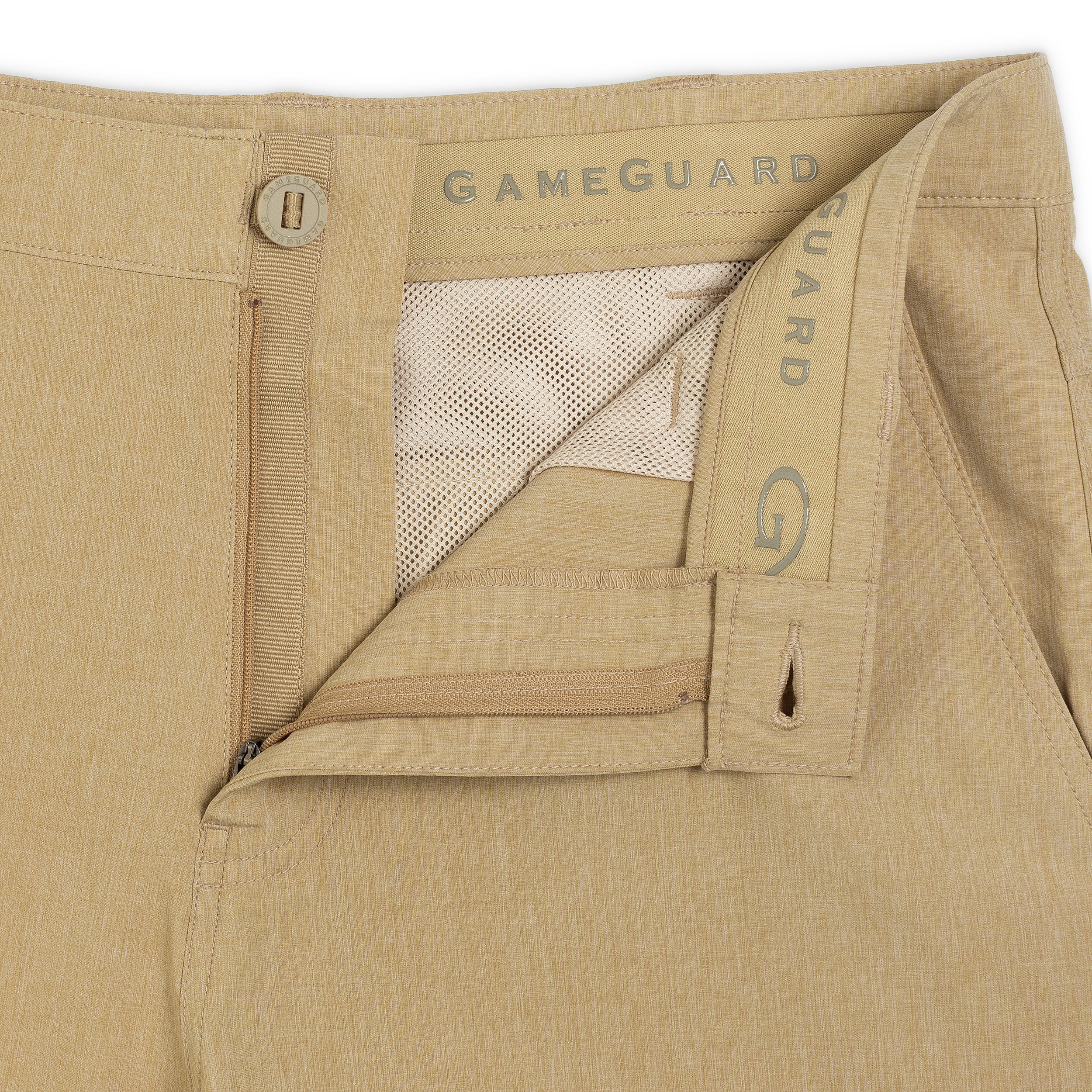 Close-up of beige pants with 'GameGuard' branding on a white background
