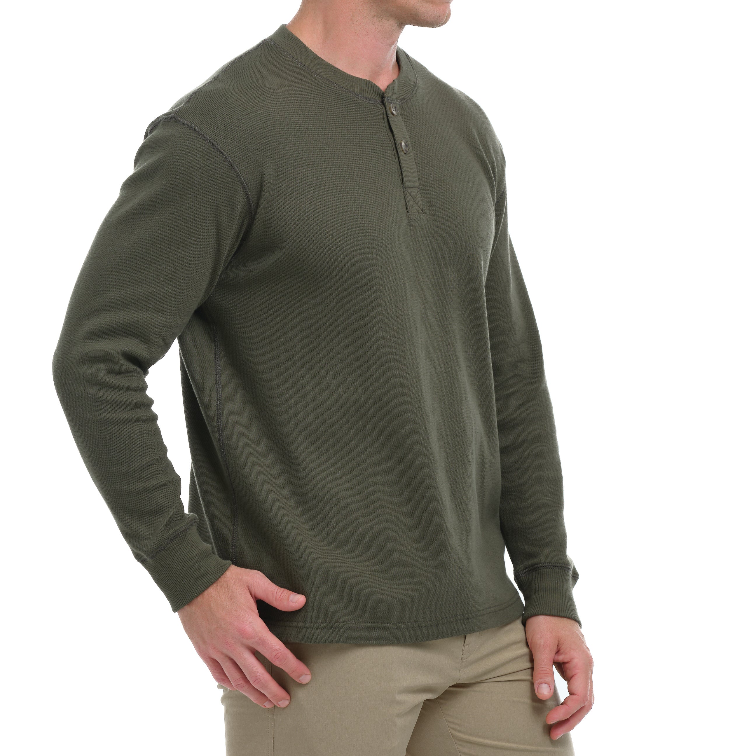 Man wearing a green long-sleeve henley shirt on a white background