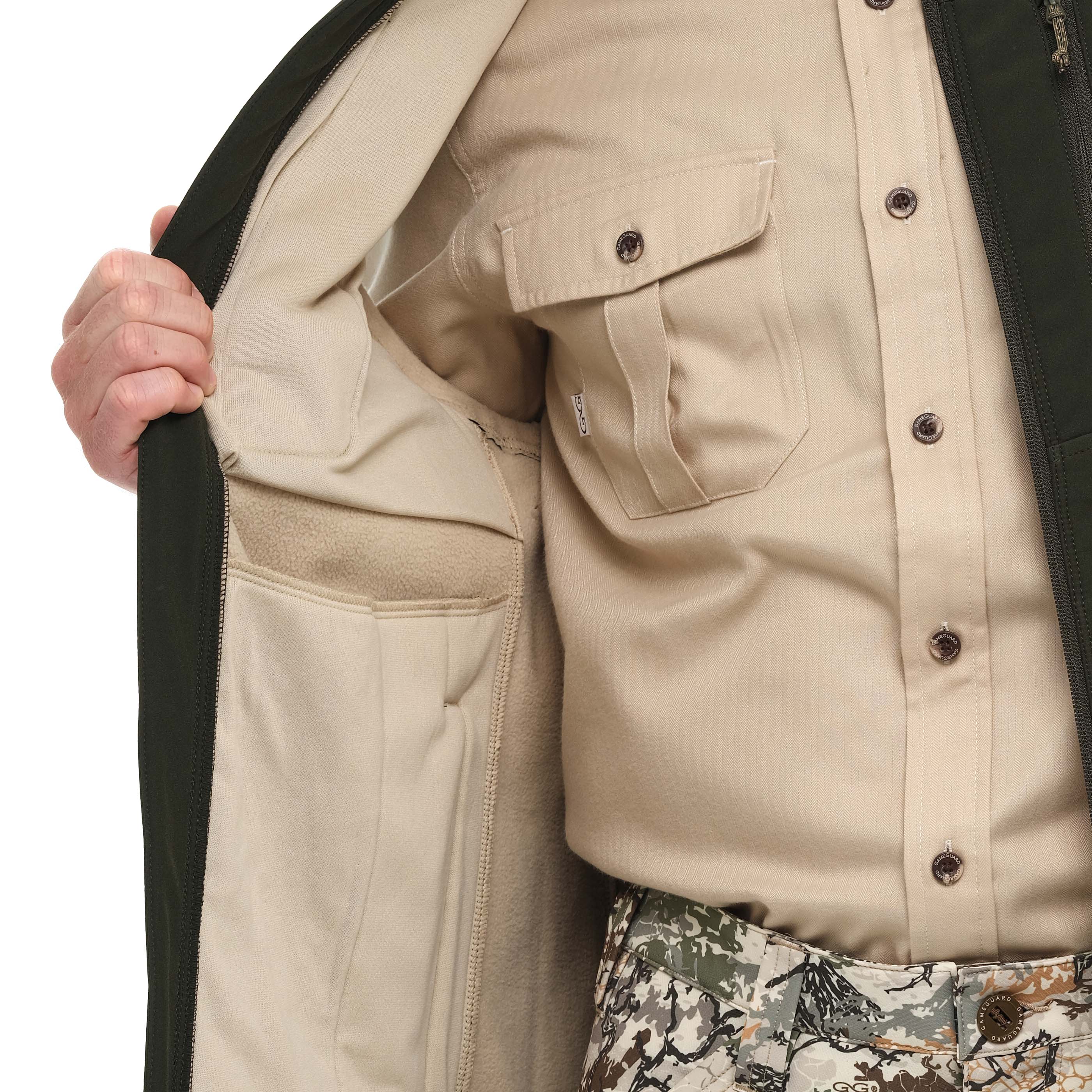 Close-up of a beige jacket with a focus on the pocket area.
