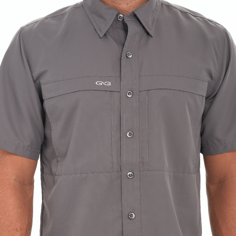 Gray short-sleeve shirt with button details on a white background