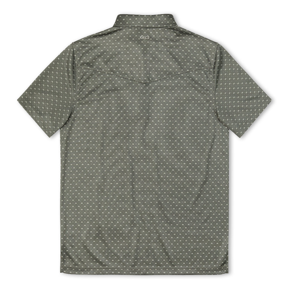 A short-sleeve collared shirt shown from the back, featuring a dark olive green base with a small repeating white geometric pattern.