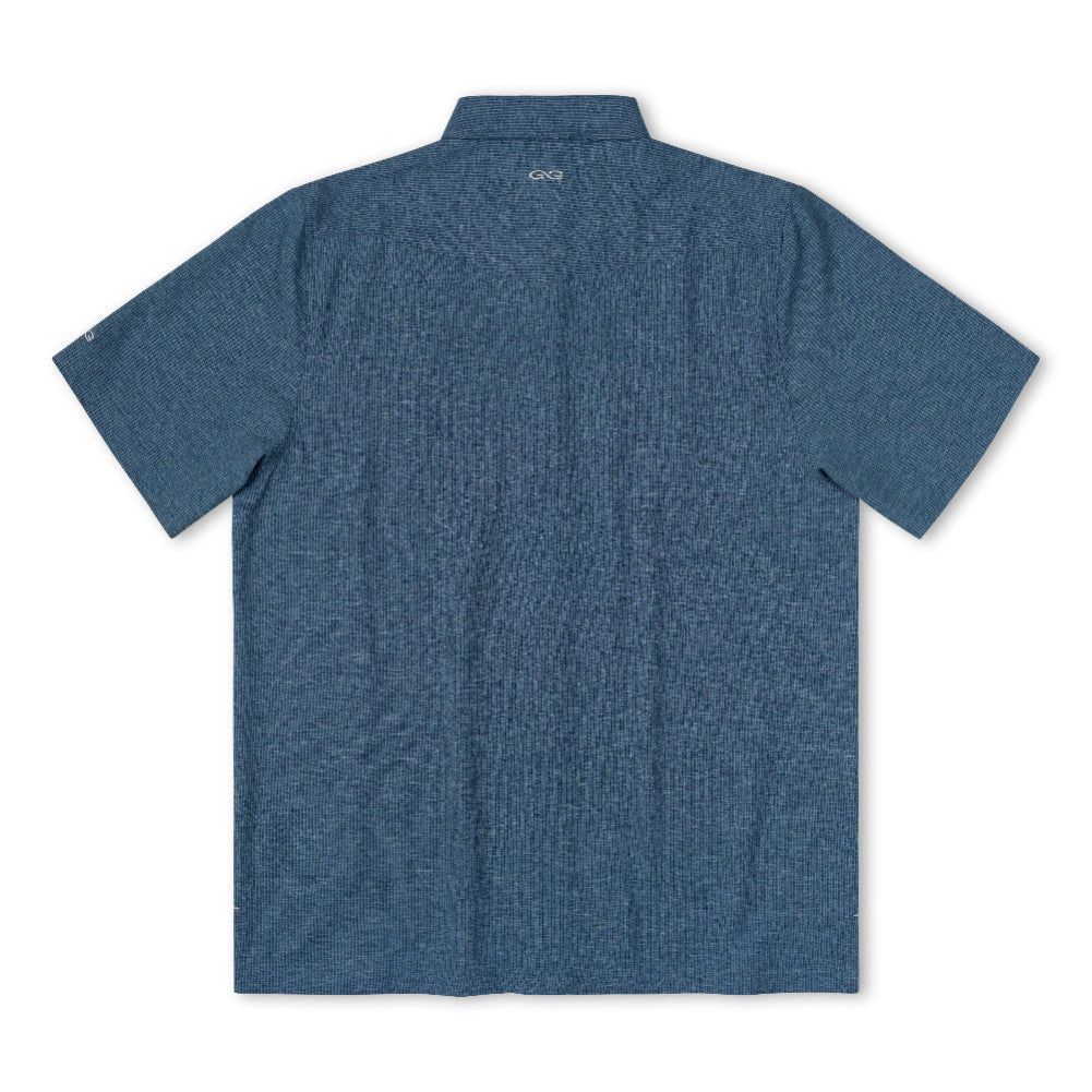 A heathered slate blue short-sleeve polo shirt shown from the back, featuring a small white 'G-1000' logo printed inside the collar, set against a plain white background.