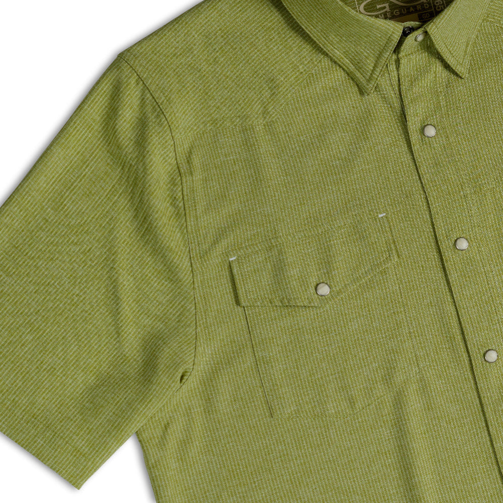 Close-up of a short-sleeve button-up shirt in olive green with a subtle vertical stripe pattern, featuring a chest pocket and white buttons.