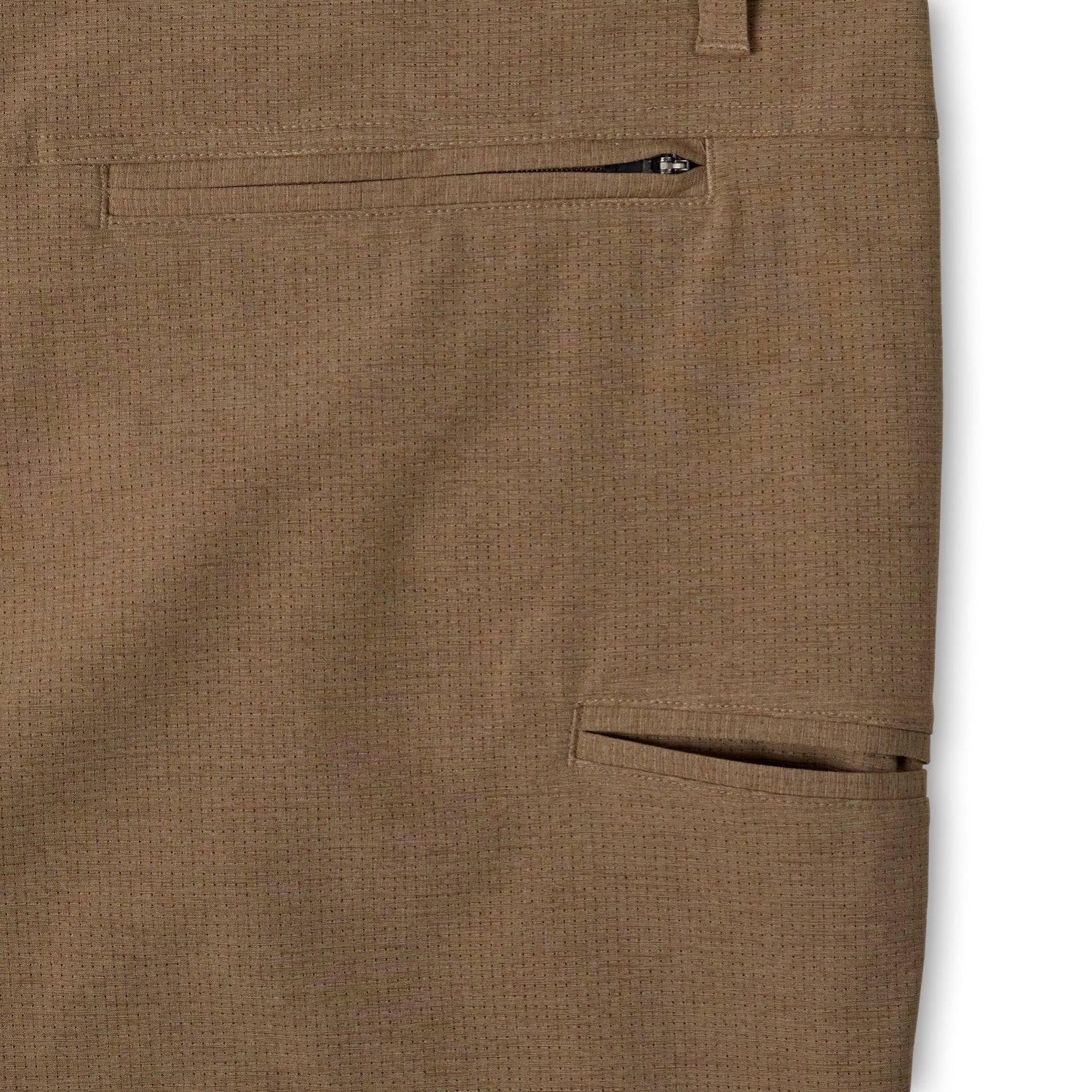 Close-up of the back of a pair of brown textured trousers showing a zippered pocket and a side slip pocket.
