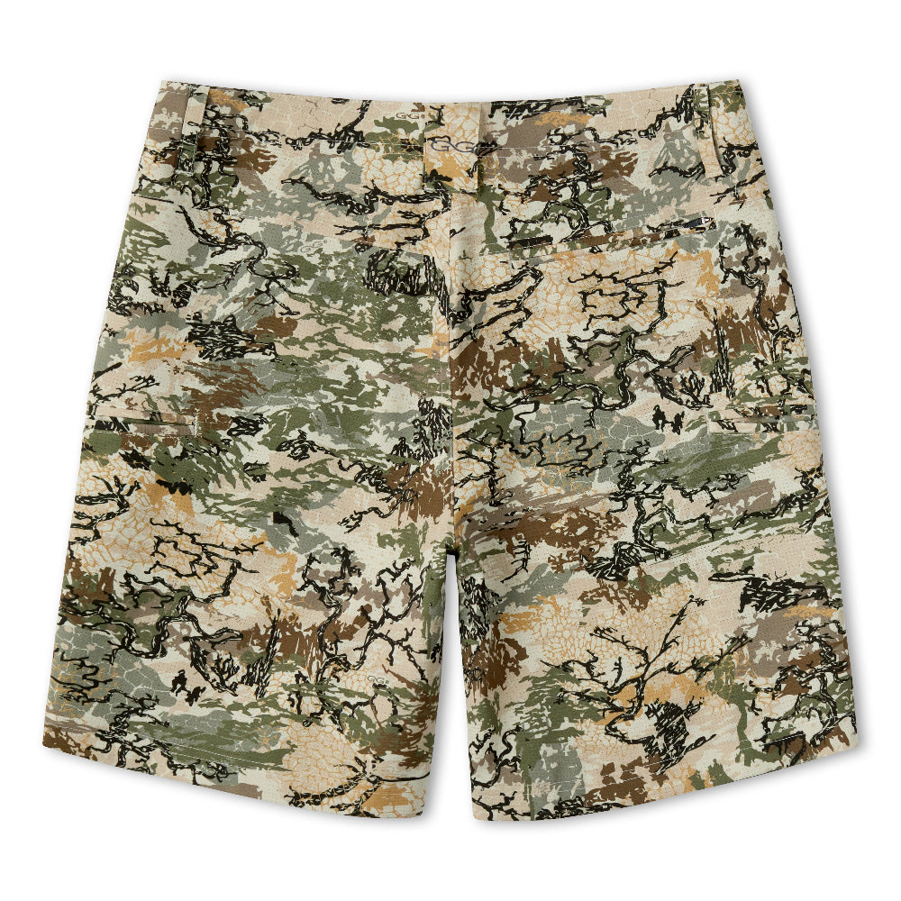 A pair of camouflage shorts in a multi-tonal pattern of beige, green, brown, and black, displayed flat against a solid white background.