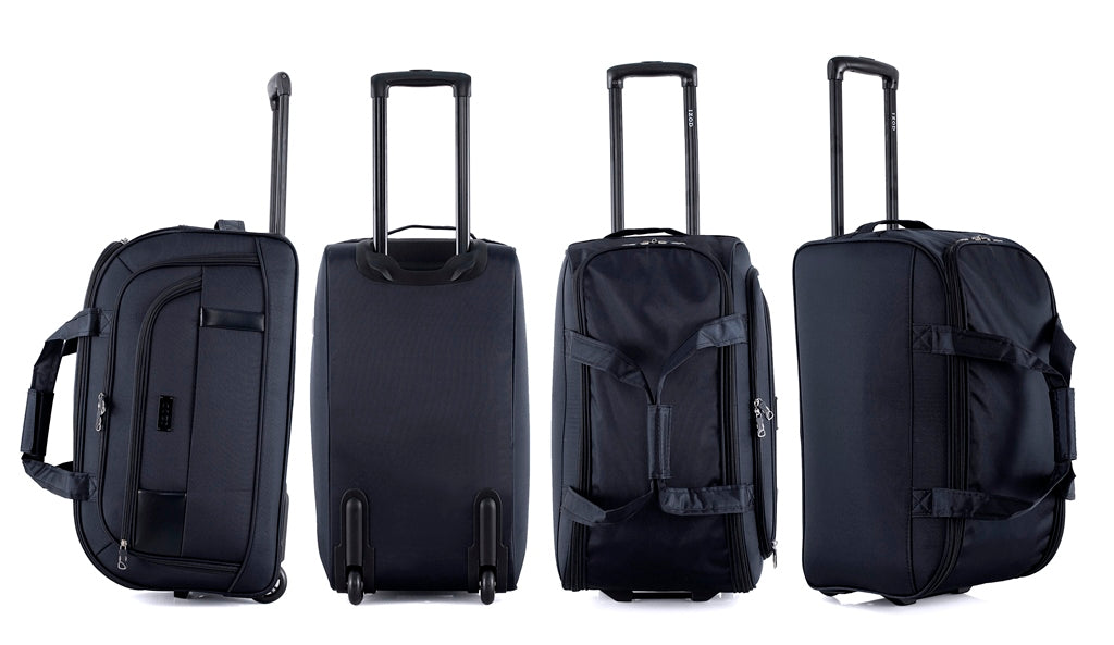 Four black suitcases of different sizes on a white background