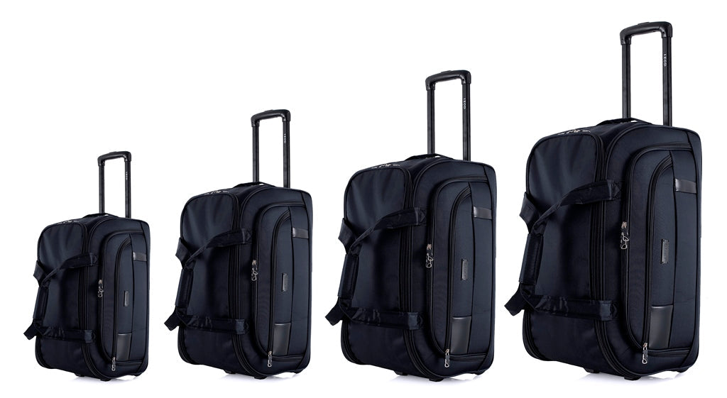 Four black suitcases of different sizes on a white background